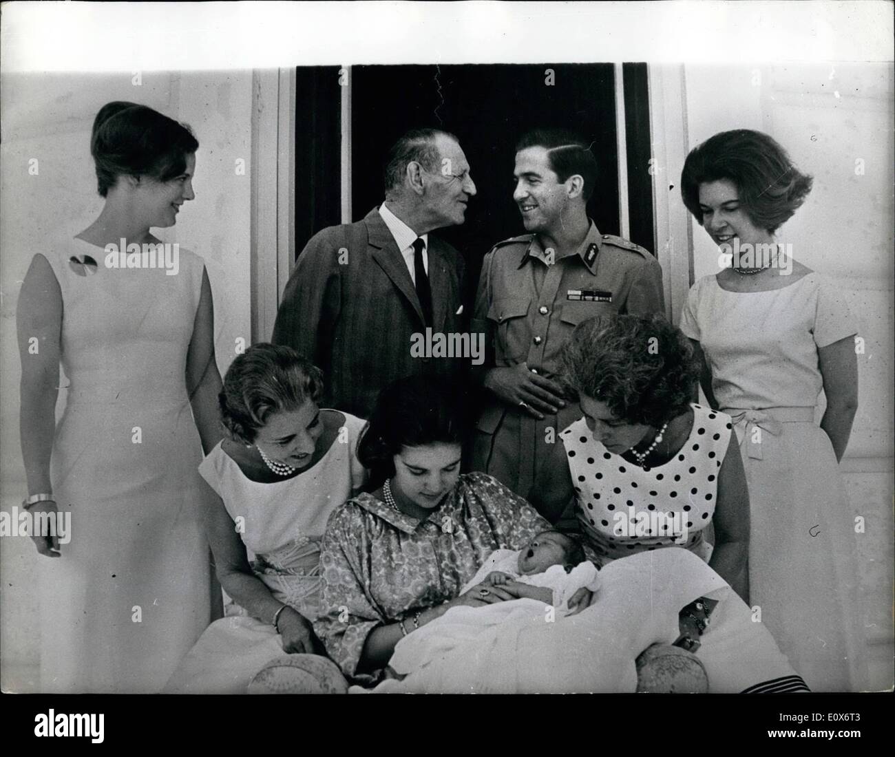Jul. 07, 1965 - Princess Alexia - The New Greek Princess: Surrounded by members of the Greek and Danish Royal Families - Queen Anne -Marie, wife of King Constantine, holds their baby princess Alexia, who was born on July 10. Seated with her are Queen Ingrid of Denmark, and Queen Mother Frederica of Greece. In background (left to right) are Princess Margrethe, of Denmark; King Frederik of Denmark, King Constantine of Greece, and Princess Irene, of Greece. Stock Photo