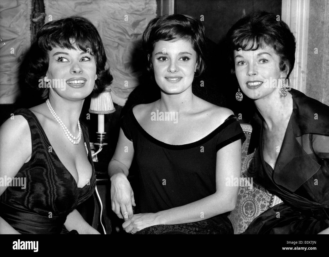 Magali Noel, Rossana Podesta and Dawn Addams at a party at Maxim's Stock Photo