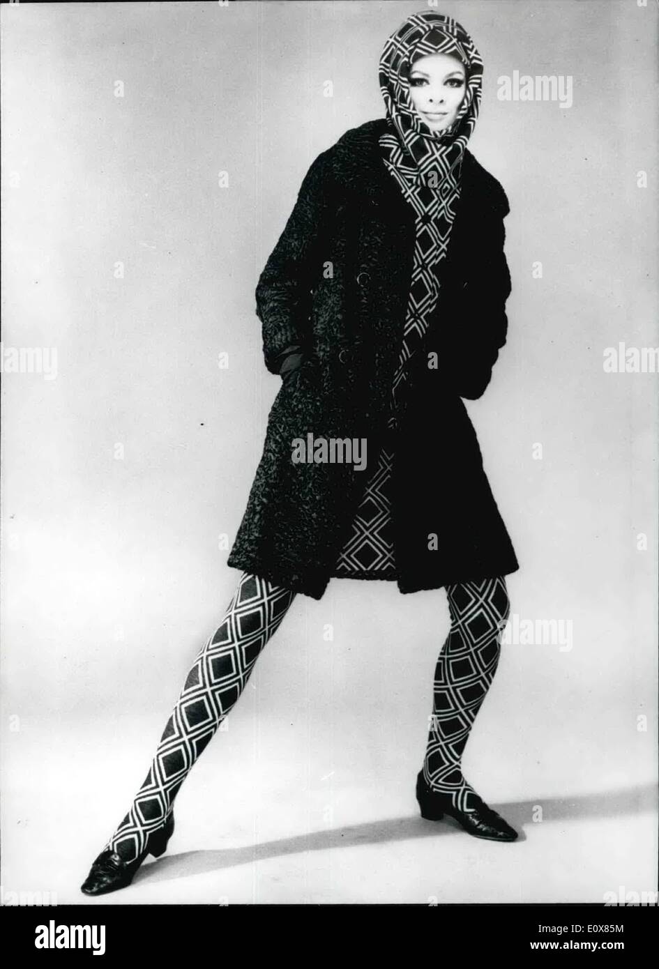 Aug. 08, 1965 - Paris Fashions: Photo shows Brown Astrakhan 3/4 coat to go with printed jersey ensemble designed by Jacques Heim for his Autumn and Winter Collections. Stock Photo