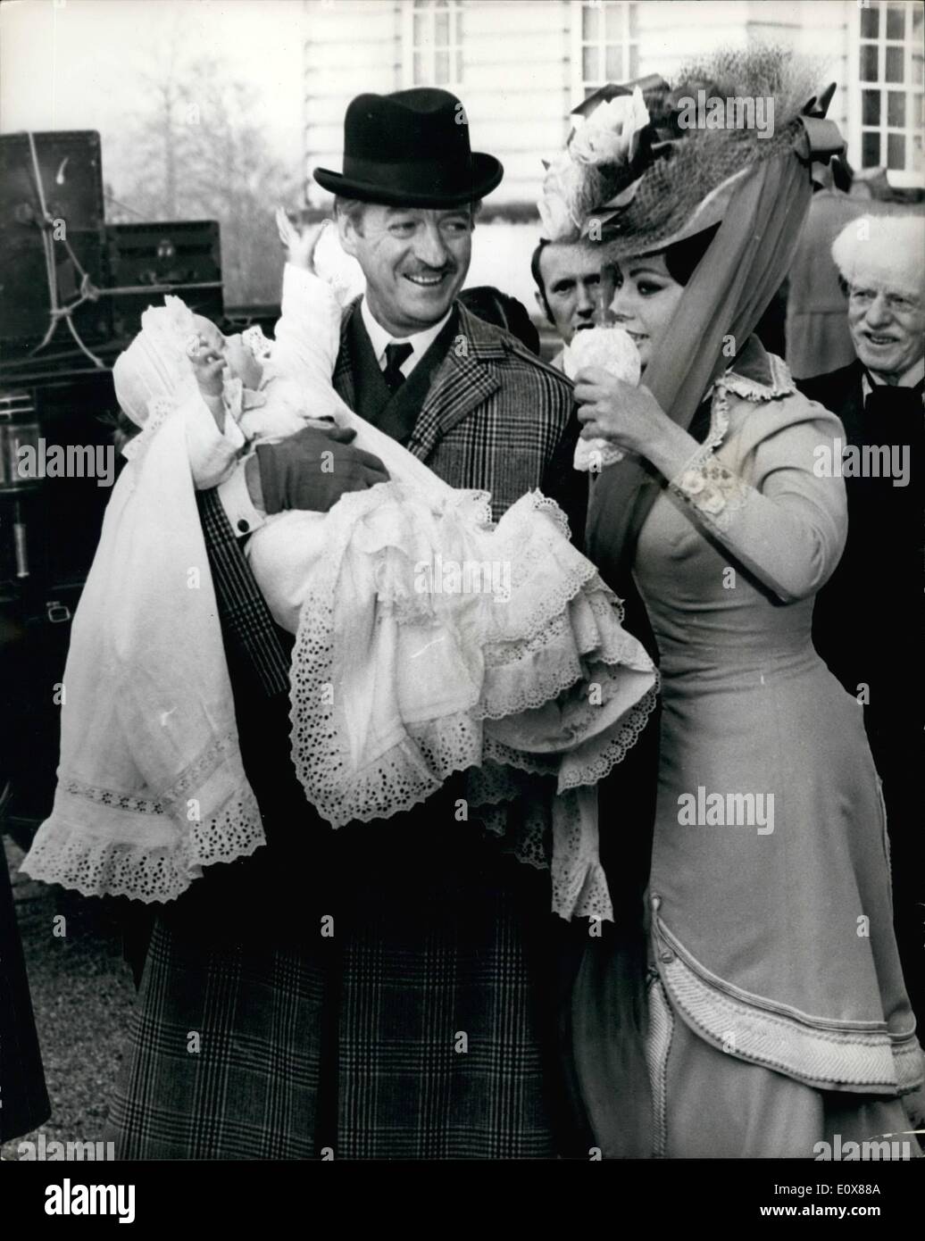 Sep. 09, 1965 - Edwardian Heir returns - with the most Beautiful Mother in the world.: It was a great occasion at Castle Howard/ Chambermaids, butlers, footman turned out in troupes - no shortage of staff here - to see the returned of the baby heir brought by his master father - and with him his ex-trollop who had been no better than she should but had had her honour given back to he when the the baby's father put the ring on her finger. But this was no ordinary trollop mother. It was Sophia Loren Stock Photo