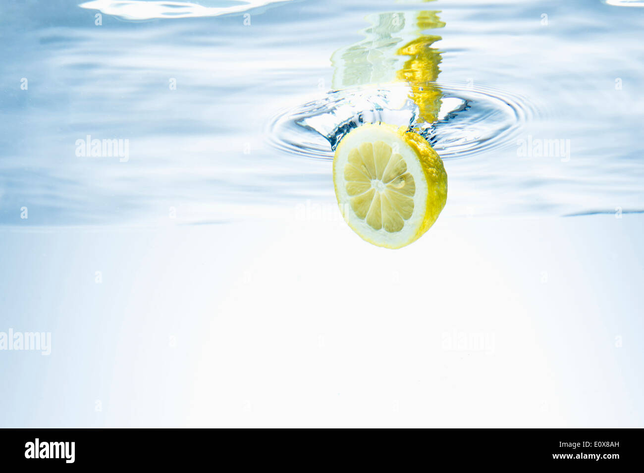 Yellow lemon falling deep hi-res stock photography and images - Alamy