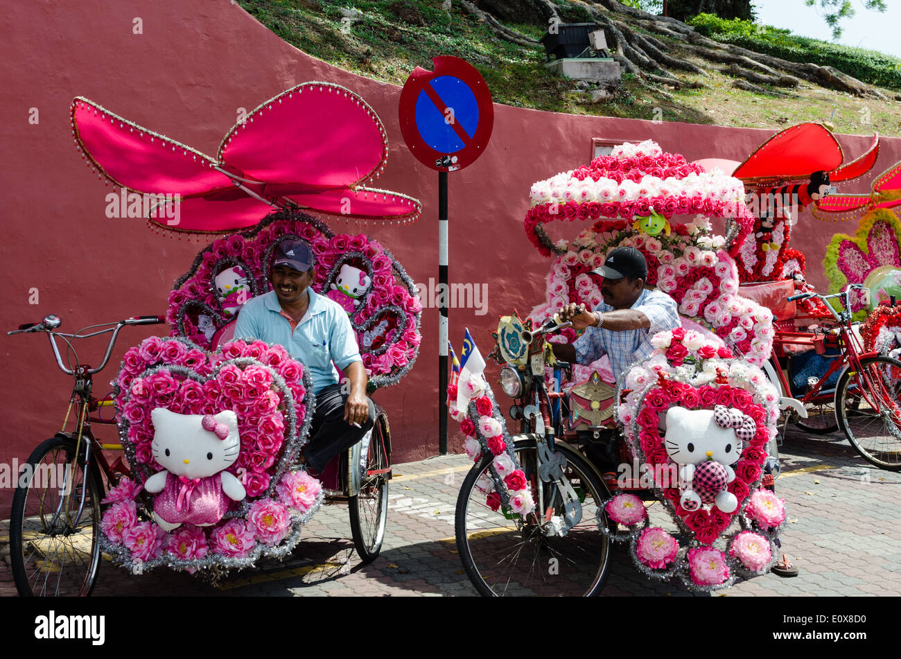 Trishaw riders in the Malaysioan city of malacca or Melaka Stock Photo