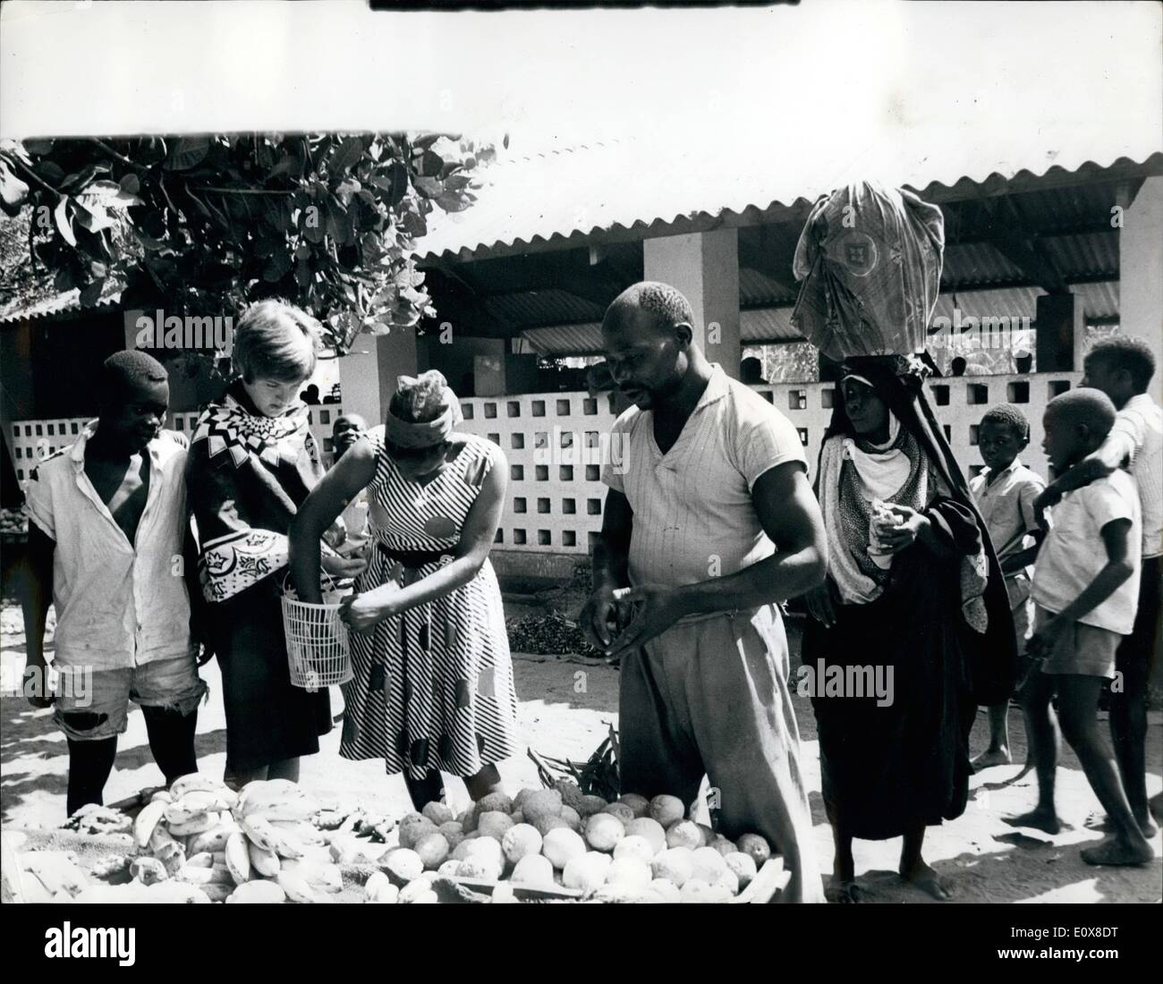 Aug. 08, 1965 - American And Canadian Experimenters In International Living: A group of ten Americans and one Canadian girl - experimenters in International Living, are at present living with farmers at a village near Dar es Salaam, Tanzania. Photo Shows: The Canadian girl, Elizabeth Goodwin, of St. Catharines, Ontario - in a market at Dar es Salaam. Stock Photo