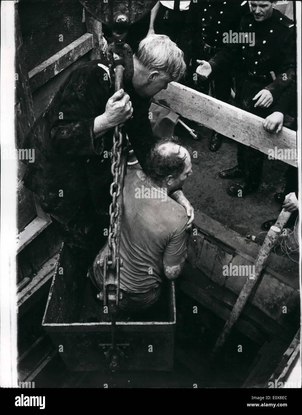 Aug. 08, 1965 - Gassed Workmen rescued from Sewer: Five firemen were injured in a struggle 20ft. below ground yesterday as they Stock Photo