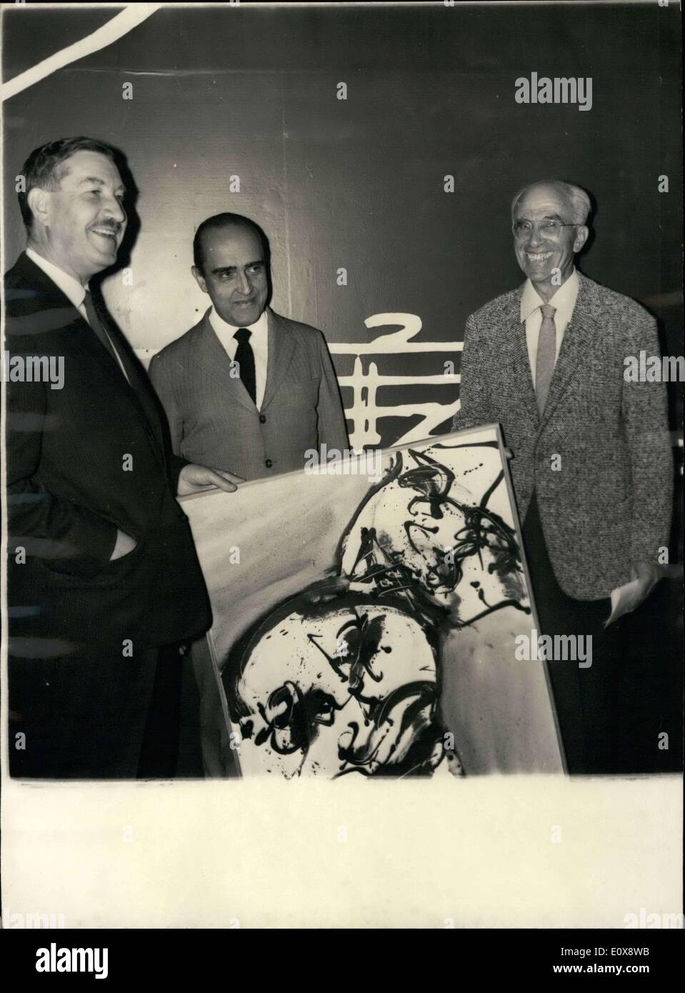 Sep. 20, 1965 - Brazil's Oscar Niemeyer won International Art and Architecture Grand Prize. Here is Jury President Andre Bloc (right), Niemeyer, and President of the Central Decorative Arts Union, Claudius Petit with a Ruth Francken painting. Stock Photo