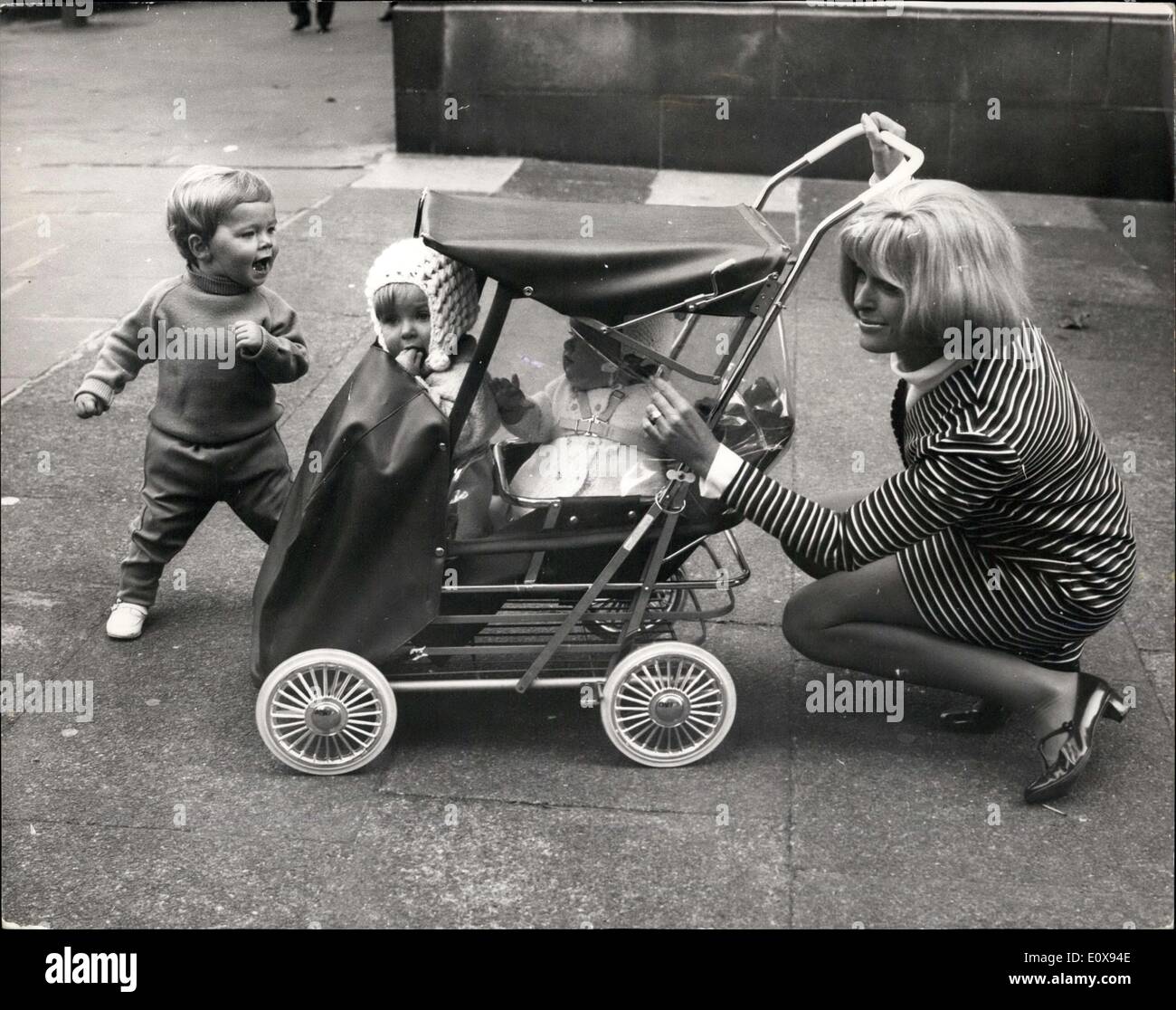 Sep. 30, 1965 - New Conception in Baby Carriage Design a ''Baby- Tandem''. After Considerable research in to modern trends on family life and the requirements of the average parents when choosin a pram, the research and design department of Patterson Edwards Ltd.(Makers of the Famous Leeway baby carriages) are introducing something completely new in baby carriage design a 'Baby-Tandem'. this new design was shown for the first time today, Prior to its Launching at the Pram Fair on October 6th Stock Photo