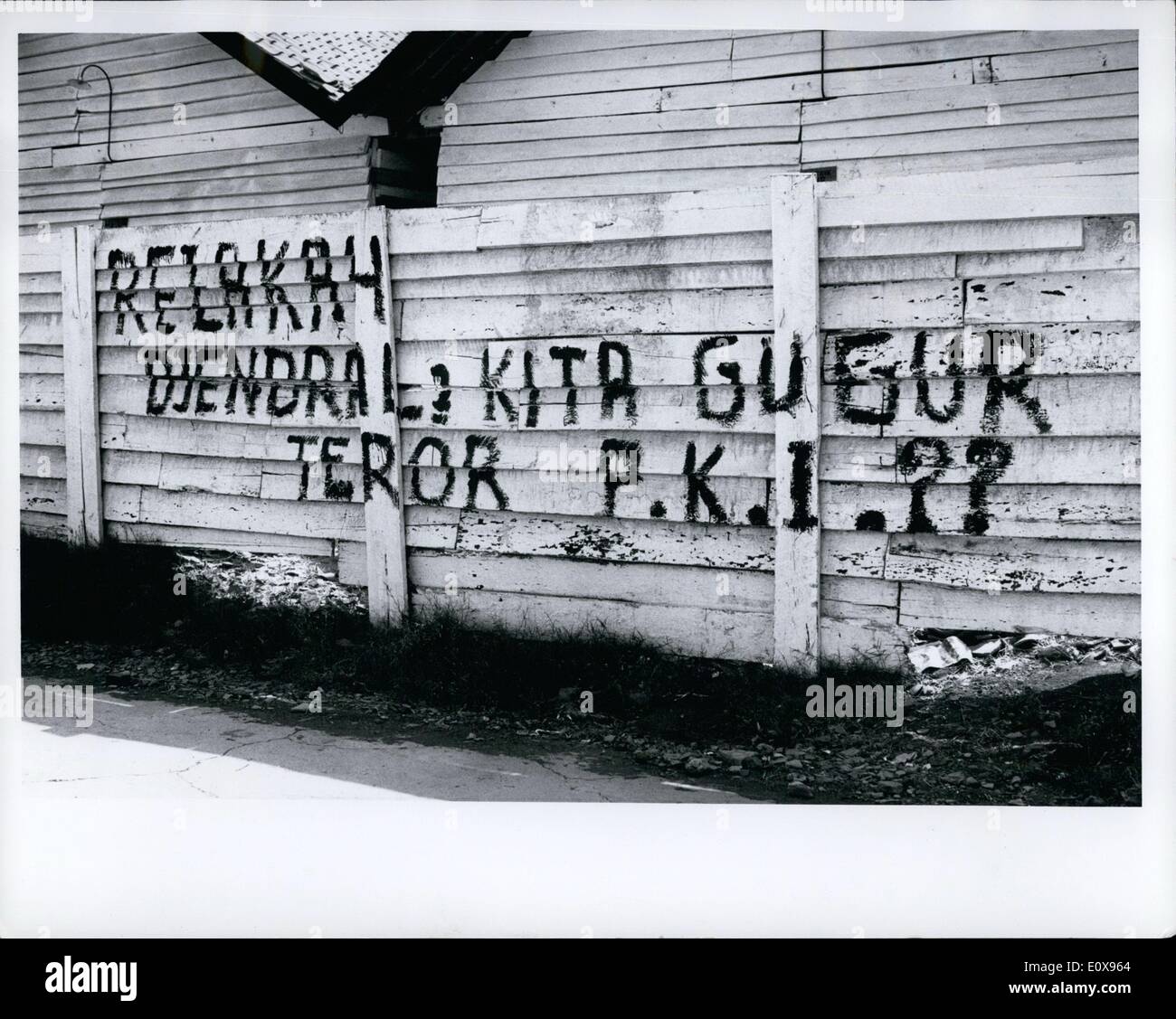Oct. 10, 1965 - Indonesia: Djakarta - fence in city after aborted communist coup of Oct. 1, 1965, says that communist party is traitor to the Indonesian revolution and charges terror tactics. These signs were seen throughout countryside after the coup. Stock Photo