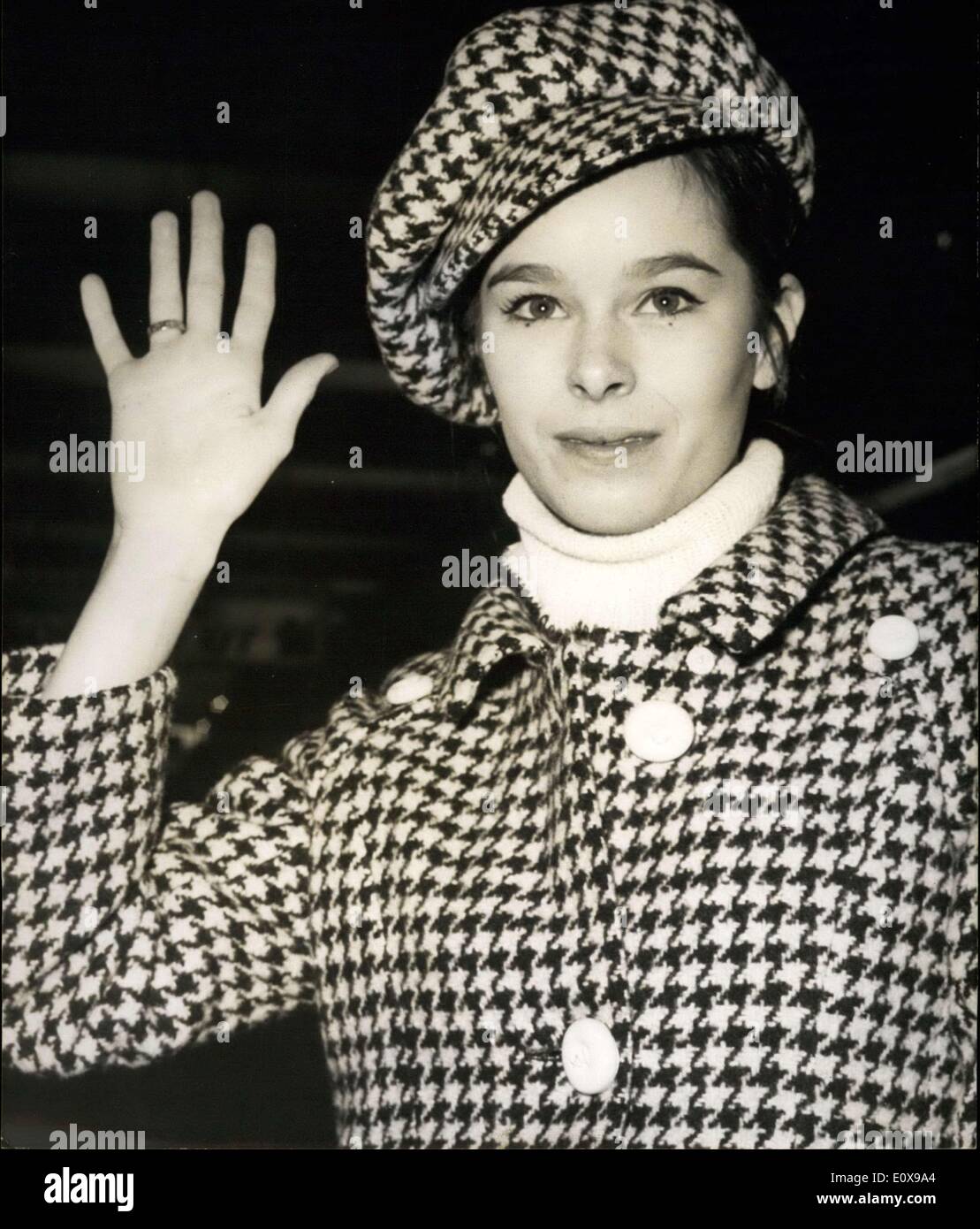 Dec. 07, 1965 - Off to New York: Geraldine Chaplin, Charlie Chaplin's actress daughter, left for New York this morning. She will attend the World Premier of the film ''Doctor Zhivago'', based on the famous Pastenak's novel in which she plays the role of Zhivago's wife opposite to Omar Sharif. Photo shows Geraldine Chaplin wearing a checkered travel outfit and a kid cap pictured at Orly Airport prior to boarding the plane. Stock Photo