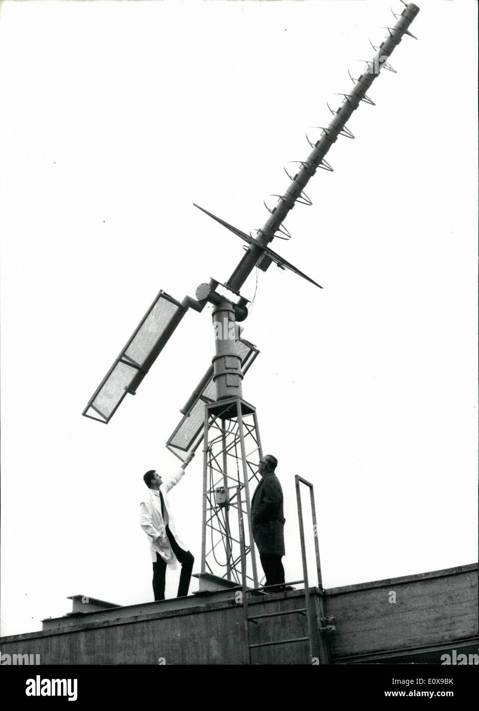 Dec. 12, 1965 - No Anti-Aircraft-Defence-Cannon: is this new super-antenna on the roof of the Offenbach weather-service. Although its name sounds very warlike, shall the meteorological-gun serve peaceable purposes. The wire-gun is an important implement for a more certain and quicker weather forecast. The German Weather Service in Offenbach makes big preparations, in order to comply with this task. At the begin of the new year will the Americans start a new weather-satellite ''TOS'' and at the same time will this meteorological gun get into action Stock Photo