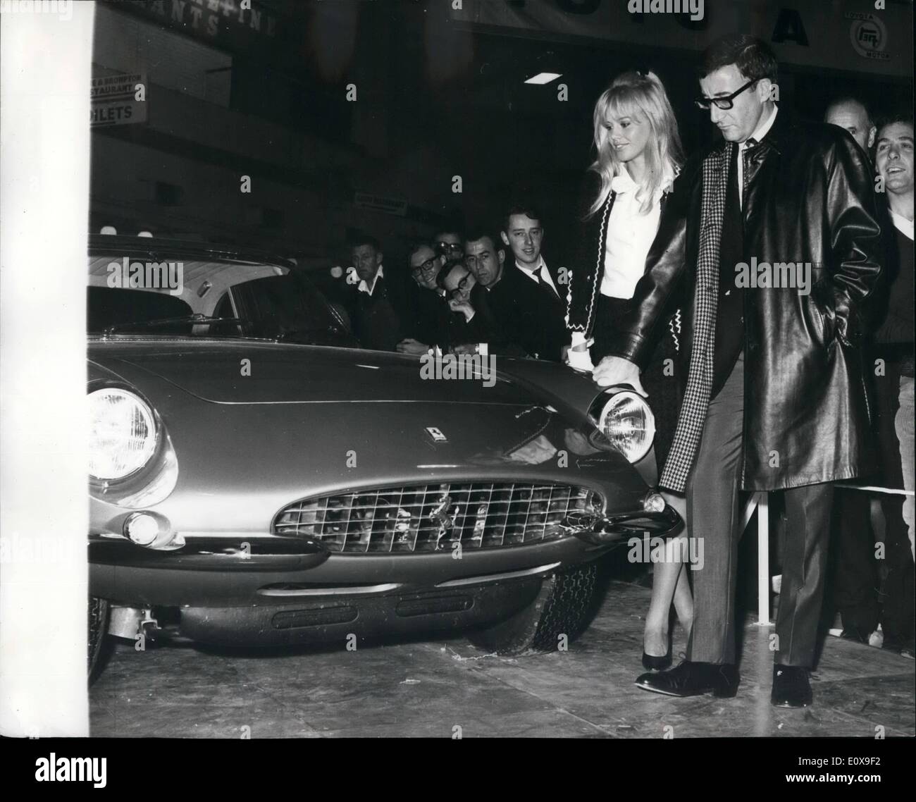 Oct. 10, 1965 - PREVIEW OF THE MOTOR SHOW AT EARLS COURT. PETER SELLERS BUYS ANOTHER CAR FOR &pound;11,500. PHOTO SHOWSPeter SellersPeter Sellers and his wife Britt Ekland looking at the new Ferrari 500 Super fast Coupe, which Peter has bought for &pound;11,500, seen at the show today. Stock Photo
