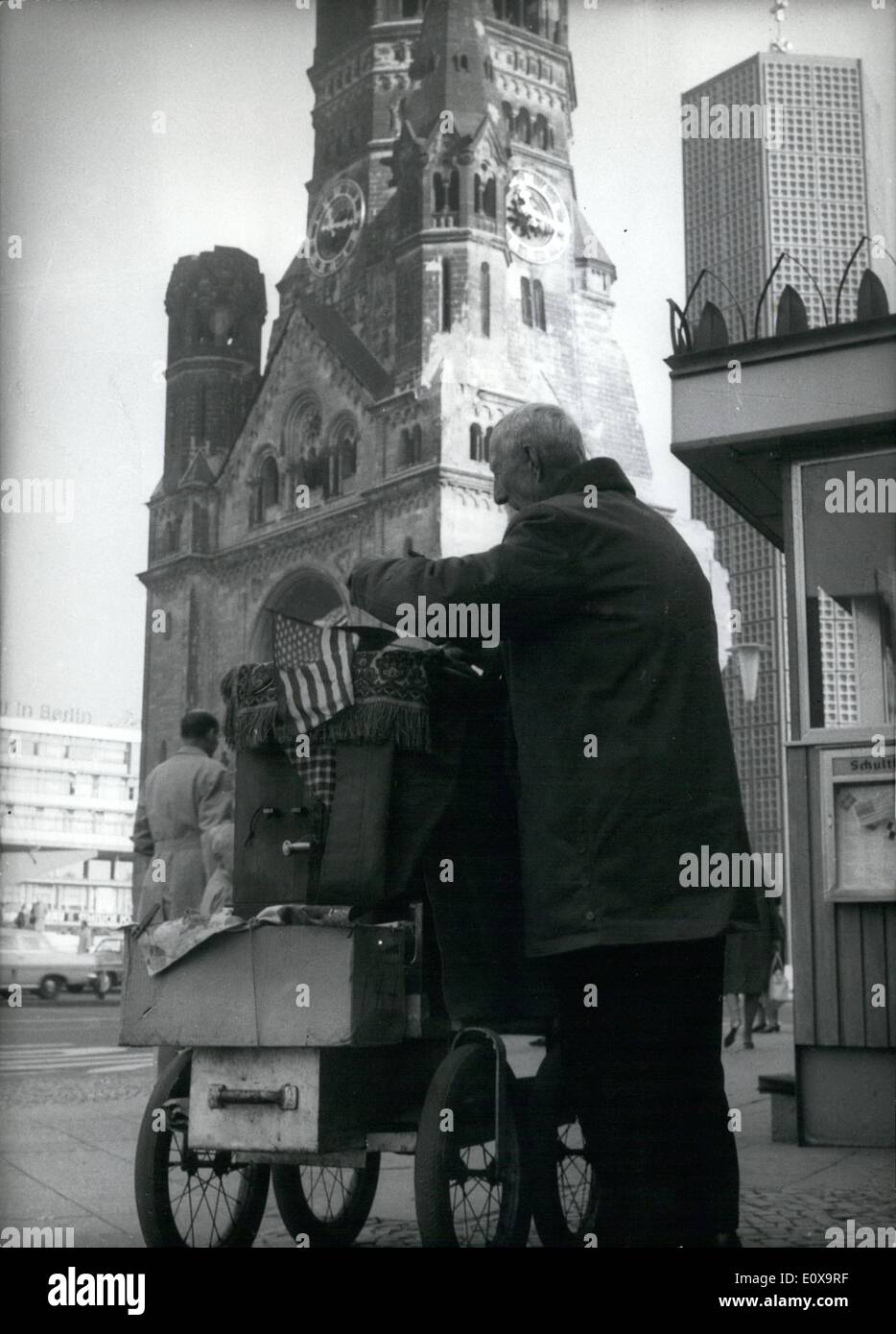 Oct. 10, 1965 - Keep Pace with the Times.: must also an organ-grinder-this seems to be this opinion of this man. The organ-grinder at the Berlin ''Kurfurstendamm'' however, expects much, when he ''flanks'' his collecting box' with an American and a British standard, surely a sign, ''that here is English spoken' Stock Photo