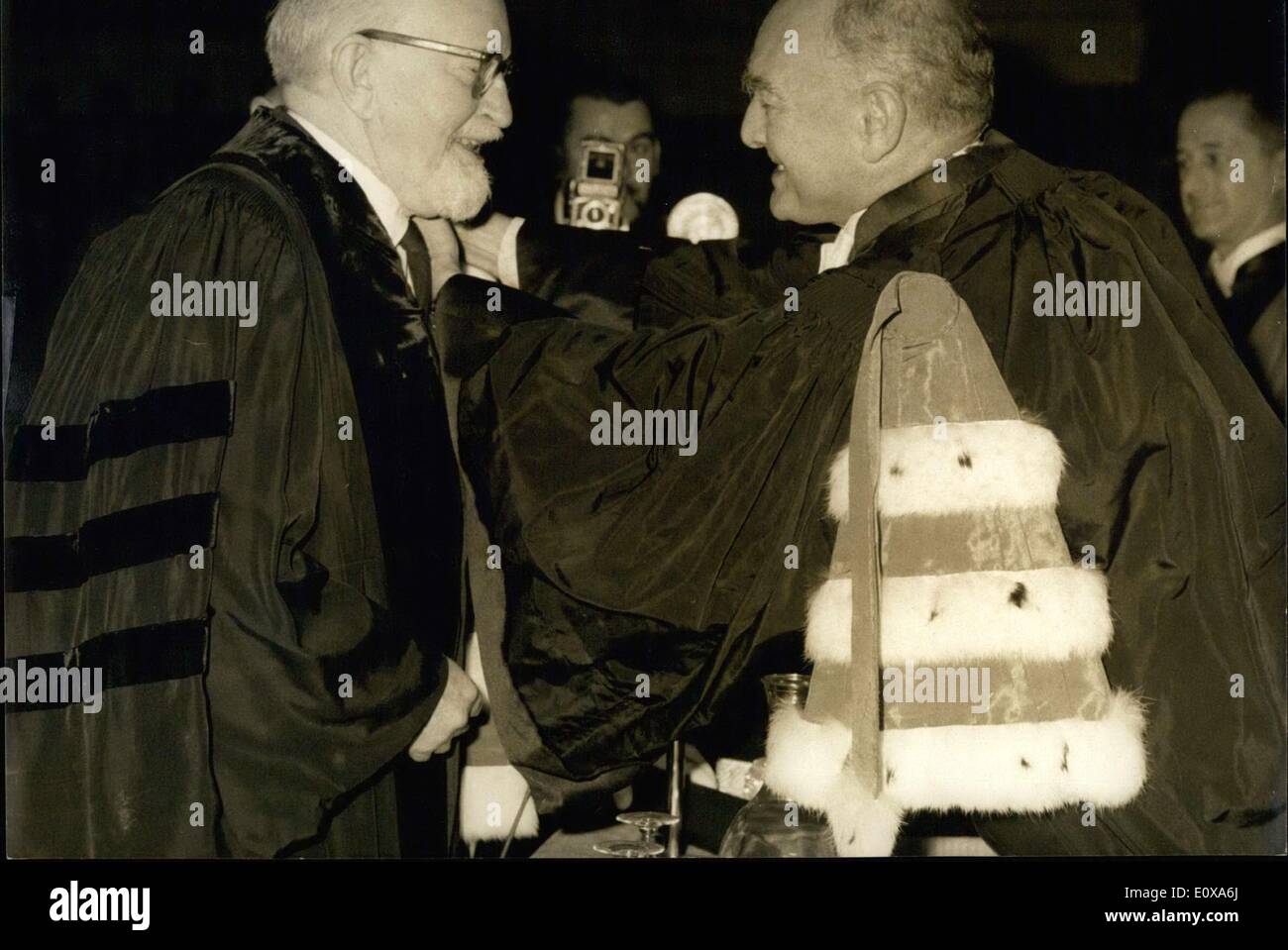Nov. 09, 1965 - Simpson, a professor at Harvard, received an honorary doctorate from the University of Paris. Christian Fouchet, Minister of National Education, presided over the ceremony at the Amphitheater at the Sorbonne. Stock Photo