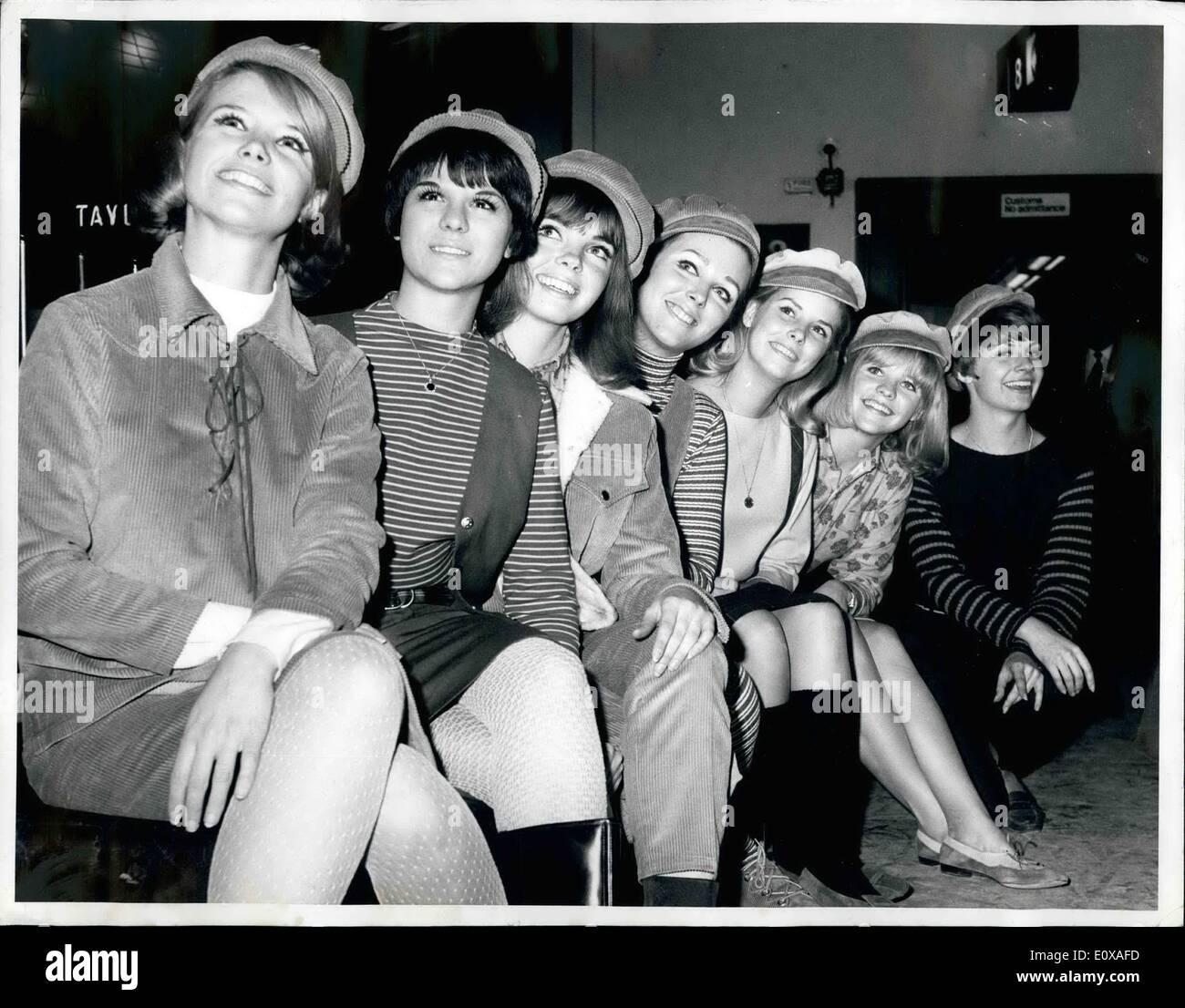 Jan. 01, 1966 - The Jantzen smile girls - arrive in London. Seven American girls - winners of the Jantzen ''Smile Contest'' - arrived in London last evening - continuing their tour of Europe - part of their prize - boosting the company's sales campaign.. The girls are here for four days - and they came from all parts of the United States.. Photo shows the lovely smiling young ladies - at London Airport last evening Stock Photo