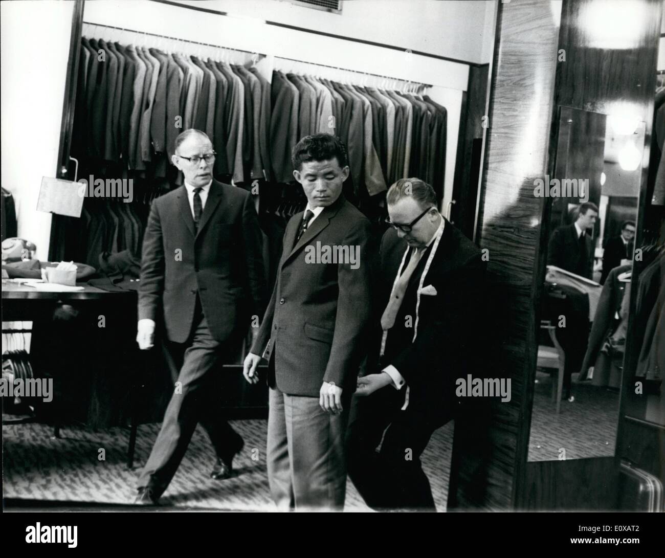 Jan. 01, 1966 - The Newest V.C. Goes to the Tailors. Rambahadur Limbu, a lance corporal in the Gurkhas who is in London to receives the V.V. from the Queen - yesterday went along to a West End branch of Burton's, where he was buying a suit - off the peg. He settled for something in charcoal twill. Of course, L/epl. Rambahadur still has to get his dress uniform - the one with the V.V. ribbon sewn into it. Lance Corporal Rambahadur Limbu of the 10th Gurkha Rifles, won his V.C. in November when he killed five Indonesian terrorists and carried two wounded men to safety Stock Photo