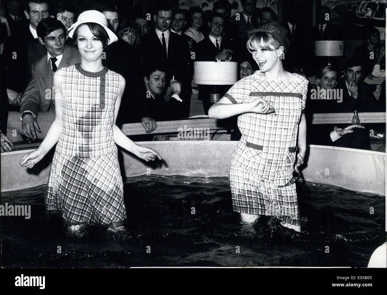 Mar. 03, 1966 - A SOMEWHAT UNCONVENTIONAL FINISH.. took place on a fashion show, which was held in a bar in Berlin on the occasion of ''die 63. Berliner Durchreise (a German fashion show which takes place every year). At the end of this fashion show for young girls, two mannequins went into the water (our picture) not be because they just wanted to, but to prove that their beautiful models ''Trixi'' and ''Dixi'' could stand the water. Stock Photo