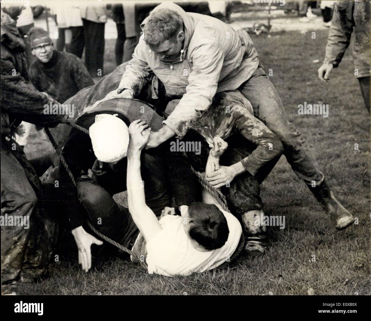 Mar. 03, 1966 - The Hospital Cup Final between Guy's and St. Thomas's took place this afternoon at Richmond Athletic Ground. Photo Shows: Horseplay among students during the pitched 'battle' which was held before the match today. Stock Photo