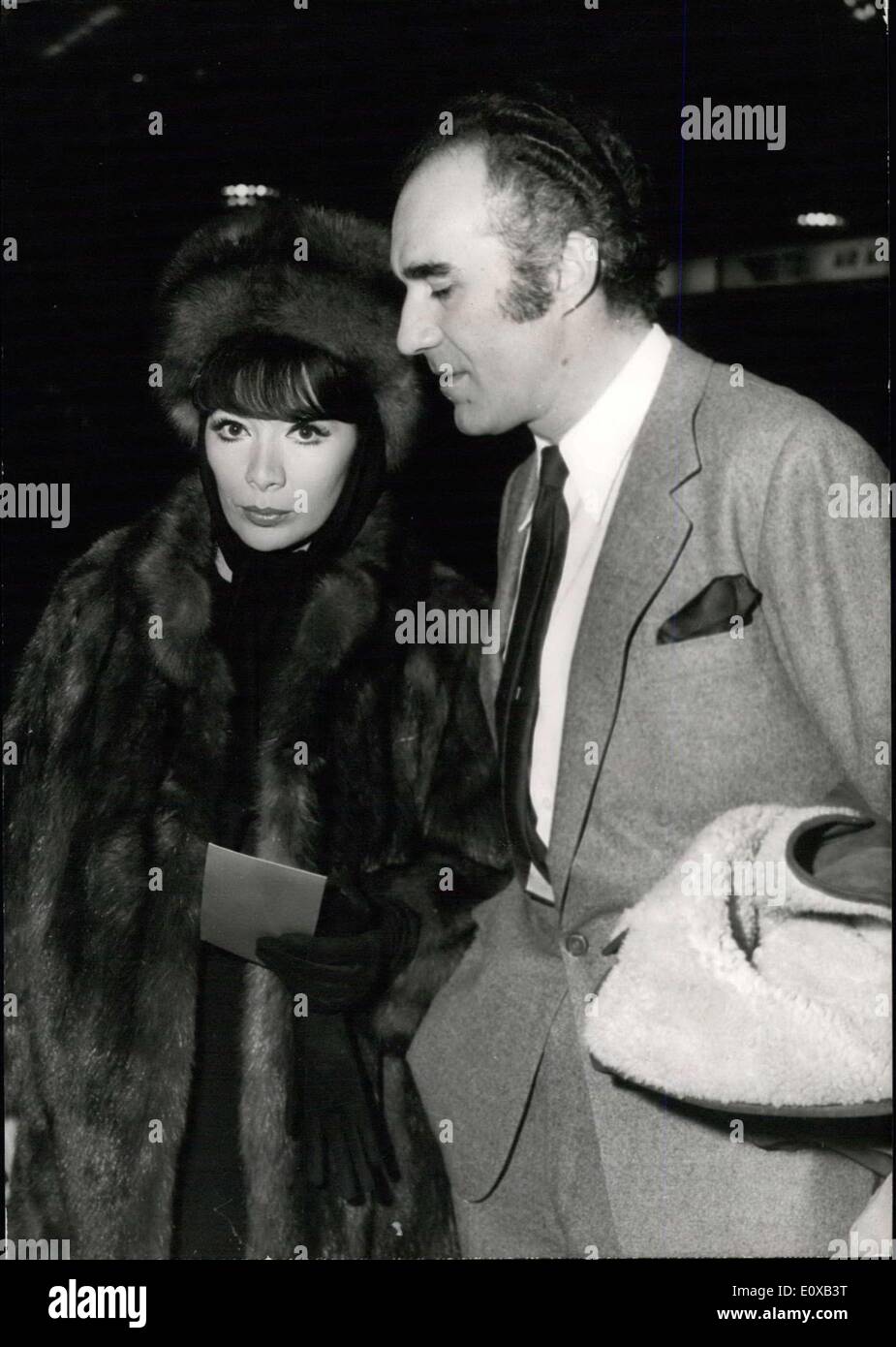 Jan. 03, 1966 - Juliette Greco To Sing In Russia?: Juliette Greco, the famous French singer who married the well-known actor Michel Piccoli in Paris recently left for a singing tour in Soviet Russia this morning. Photo shows Juliette Greco wearing a Fur coat and a Fur that pictured with her husband Michel Piccoli (who will accompany her on her Russian tour) at Orly Airport this morning/ Stock Photo