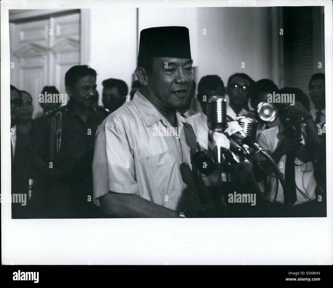 Mar. 03, 1966 - President Sukarno, at Istana Palace, Djakarta, Indonesia, Oct. 14, 1965 announces appointment of Maj Gen. Suharto as Army Chief f Staff. Suharto w replaces Lt. gen Achmad yani, who was killed by communists during aborted coup of Oct 1. Behind Sukarno - hiss chief bodyguard Brig. Gen Sabur. Sabur: Sukarno's chief of bodyguard ousted by Suharto (Sabur: behind Sukarno) ousted and arrested by Suharto.03 Stock Photo