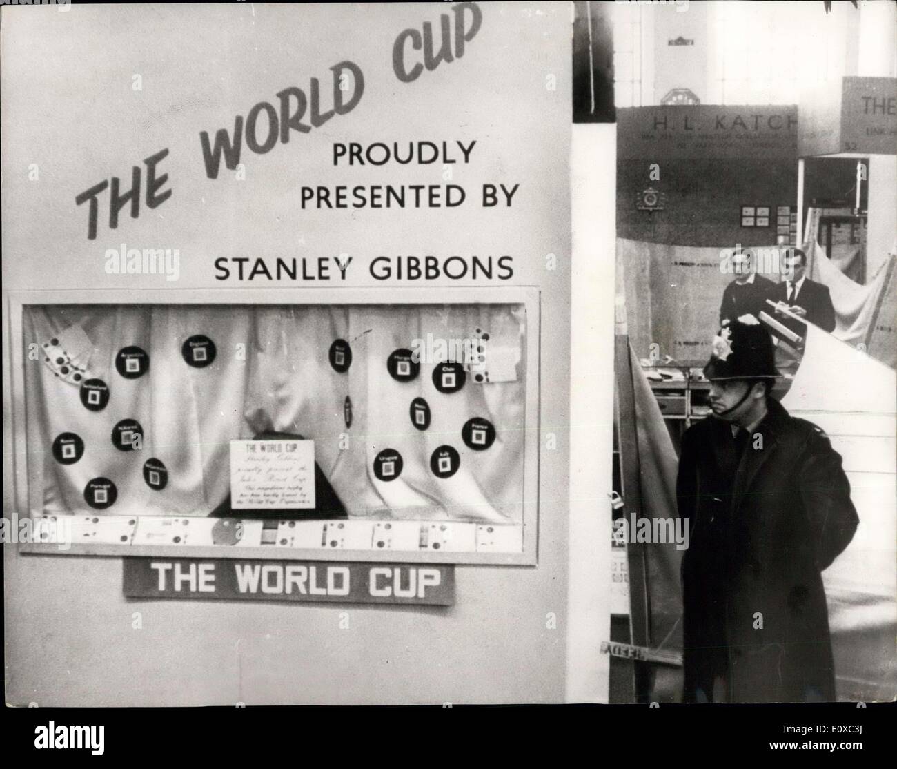 Mar. 21, 1966 - The World Cup Stolen: The famous World Cup was yesterday stolen from the Central Hall, Westminster, where it was on show at the National Stamp Exhibition. Photo shows A policeman stands guard last night - over the display case in which the World Cup stood before it was stolen. Stock Photo