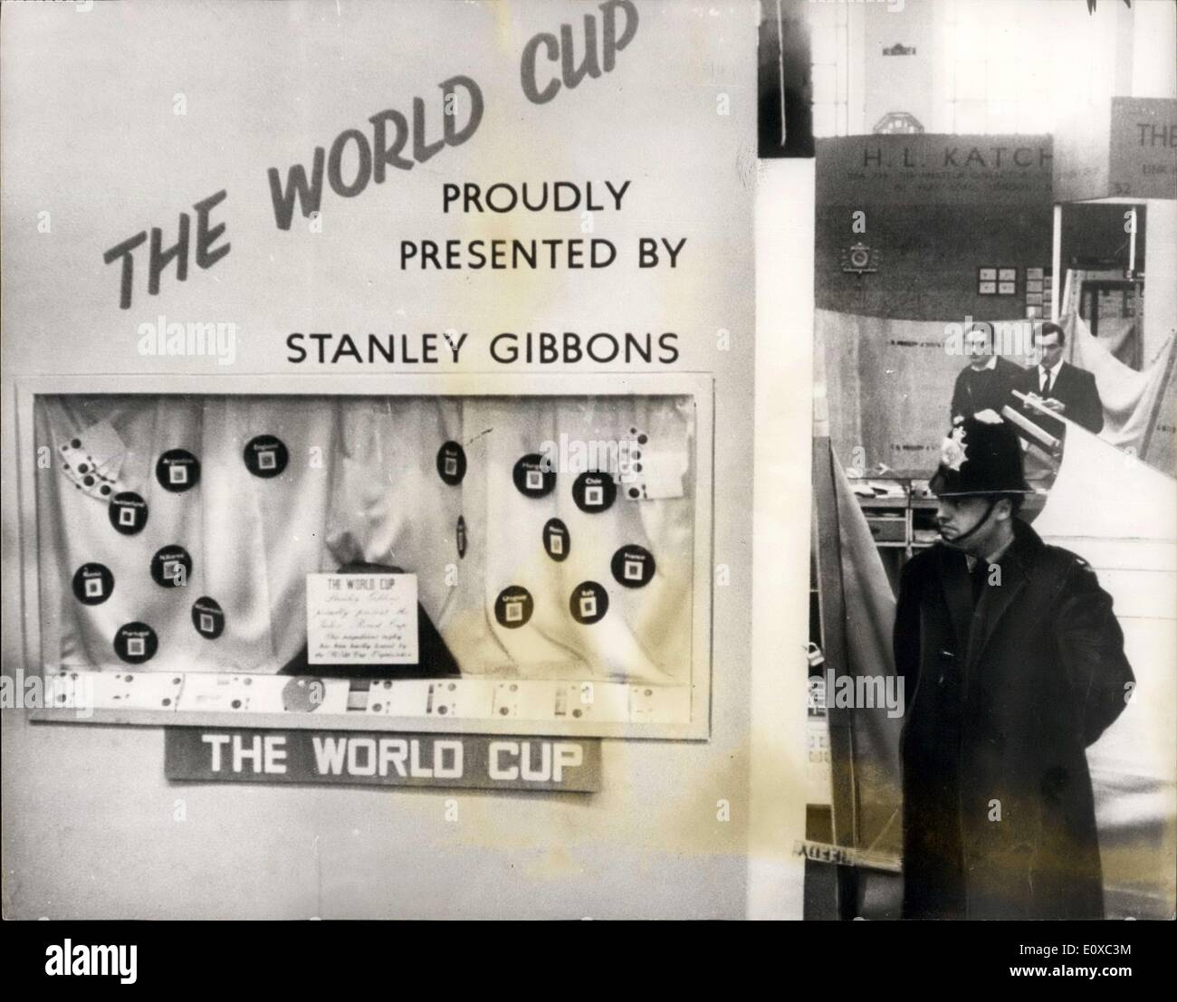 Mar. 21, 1966 - The World Cup Stolen: The famous World Cup was yesterday stolen from the Central Hall, Westminster, where it was on show at the National Stamp Exhibition. Photo shows A policeman stands guard last night over the display case in which the World Cup stood before it was stolen. Stock Photo