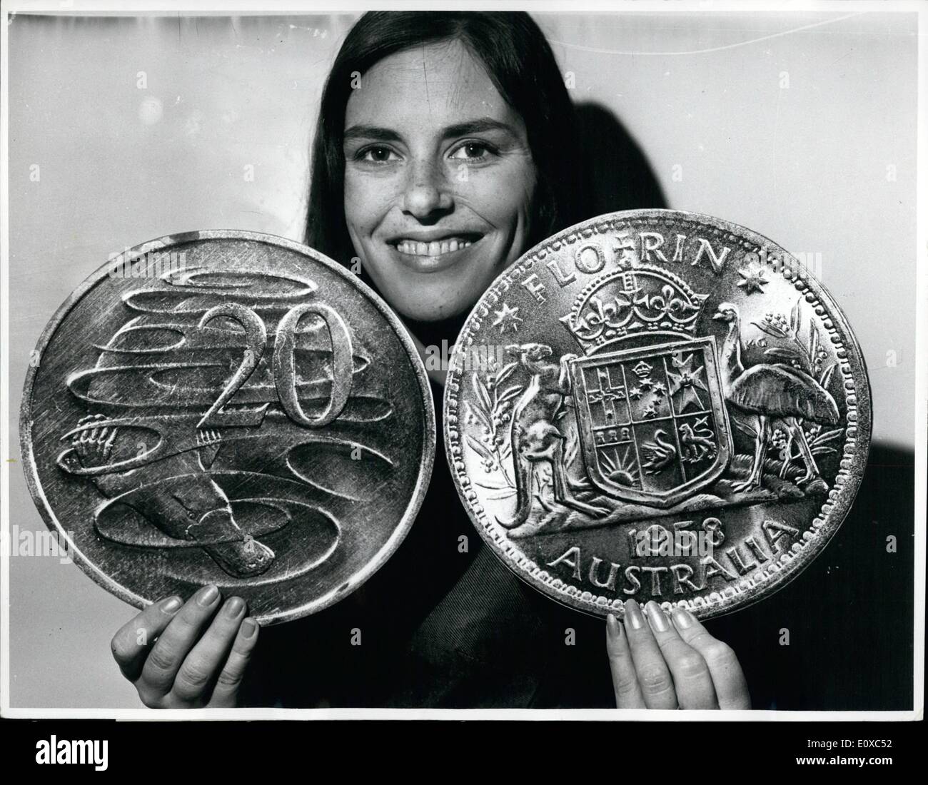 Feb. 02, 1966 - Decimal currency in Australia: Australia's change to decimal currency in February, 1966, was a major event. Above are replicas of the new 20 cent coin and two shilling piece, which are used in illustrating the new and old coins. Stock Photo