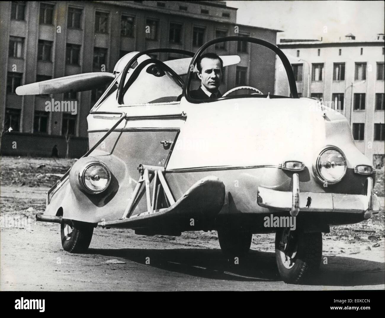 Apr. 04, 1966 - Introducing Autoaeromobile: The vehicle on the picture has a long name: Autoaero-mobile. It is capable of developing a speed of 120 kms. P.H. on dry land, 80 km. on snow and 50km. on after. The vehicle was developed by soviet mechanic V. Krunkov who, is now working on a new air-cushion model. Photo Shows Kurunkov at the whell of his autoaeromobile. Stock Photo