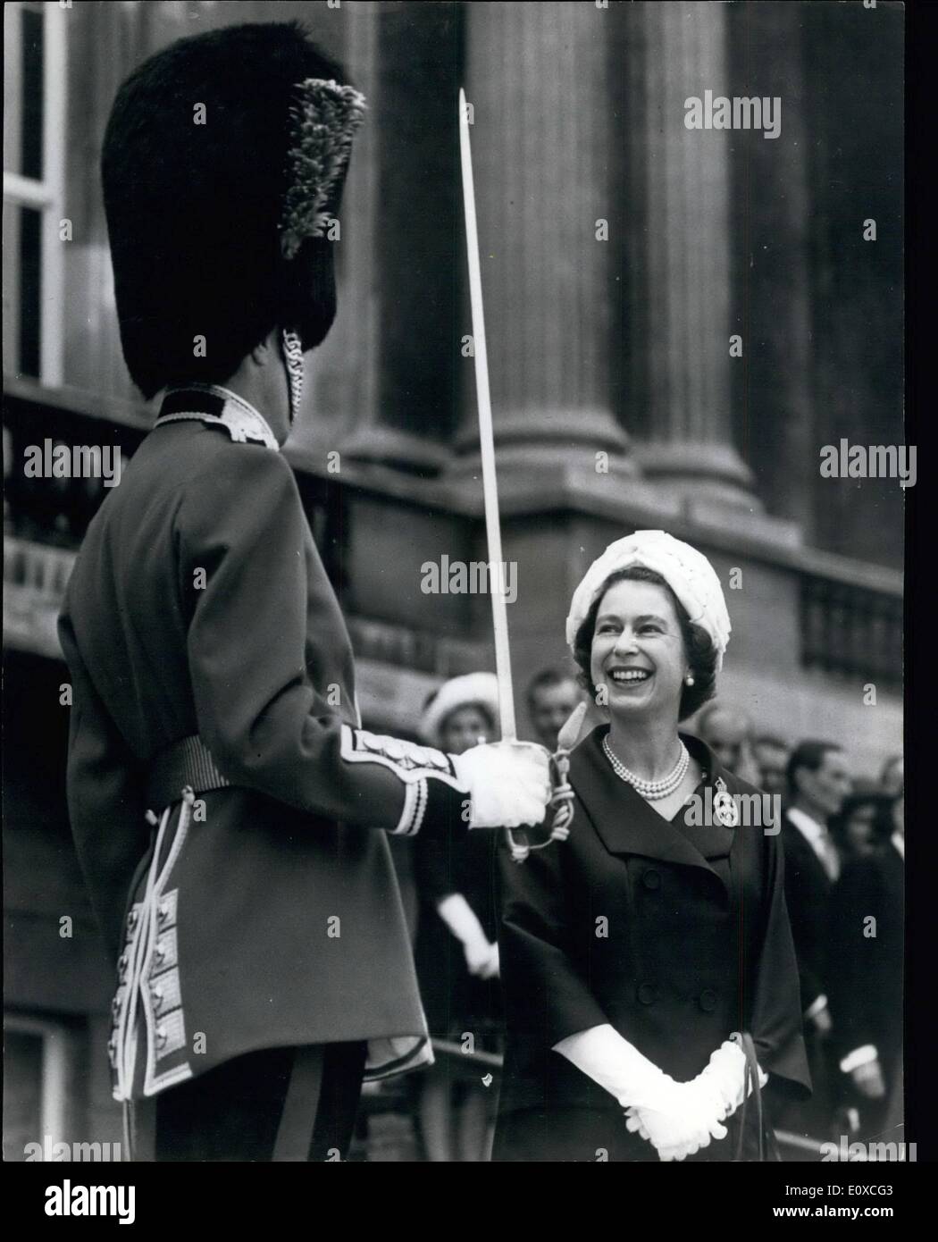 Jun. 06, 1966 - The Queen Presents Colours To The Irish Guards: H.M. The Queen today presented new colours to the 1st. Battalion, The Irish Guards, on the lawn at Buckingham Palace. Photo shows H.M. The Queen smiles at the Regimental Lieutenant Colonel, Colonel C.W.D. Harvey-Kelly during today's Presentation of Colours parade Stock Photo