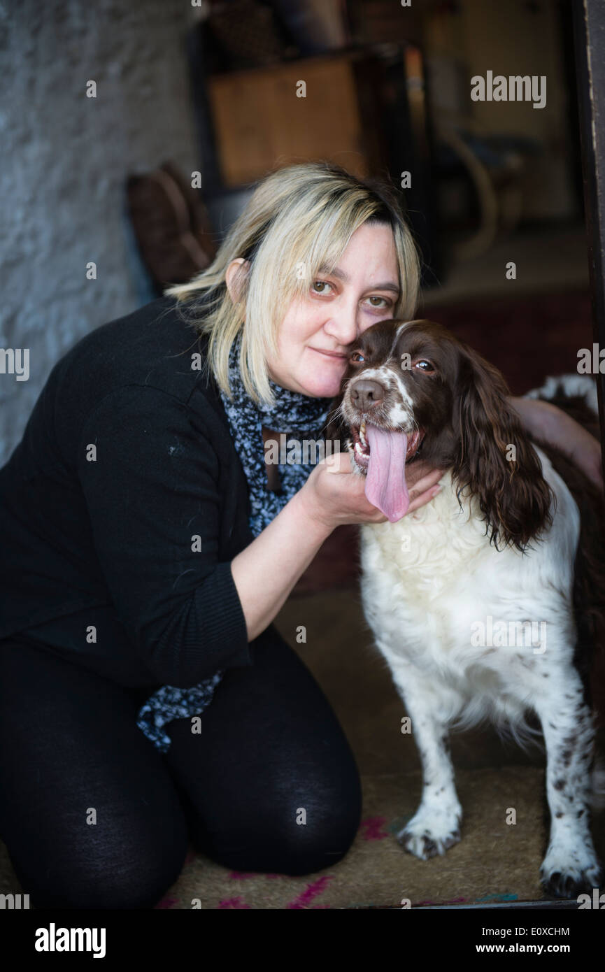 RACHEL HAYES, with her five year old pet springer spaniel dog MOLLYPOPS who saved her life when she choked on a sweet, UK Stock Photo