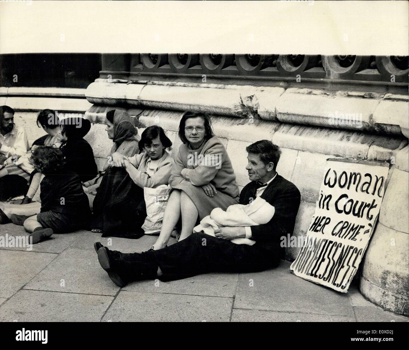 Apr. 25, 1966 - Protest Demonstration In London: A demonstration outside the Law Courts in London today, was staged by more than 200 women and children from the King Hill hostel for homeless families in West Malling, Kent. The demonstrators sat on the pavement as the High Court began considering an eviction section brought by Kent County Council against one of the residents, Mrs. Jean Daniels. The demonstration was organized by the ''Friends of King Hill'', and a spokesman said: ''We are protesting against the eviction order. This is a test case and if the council wins and Mrs Stock Photo