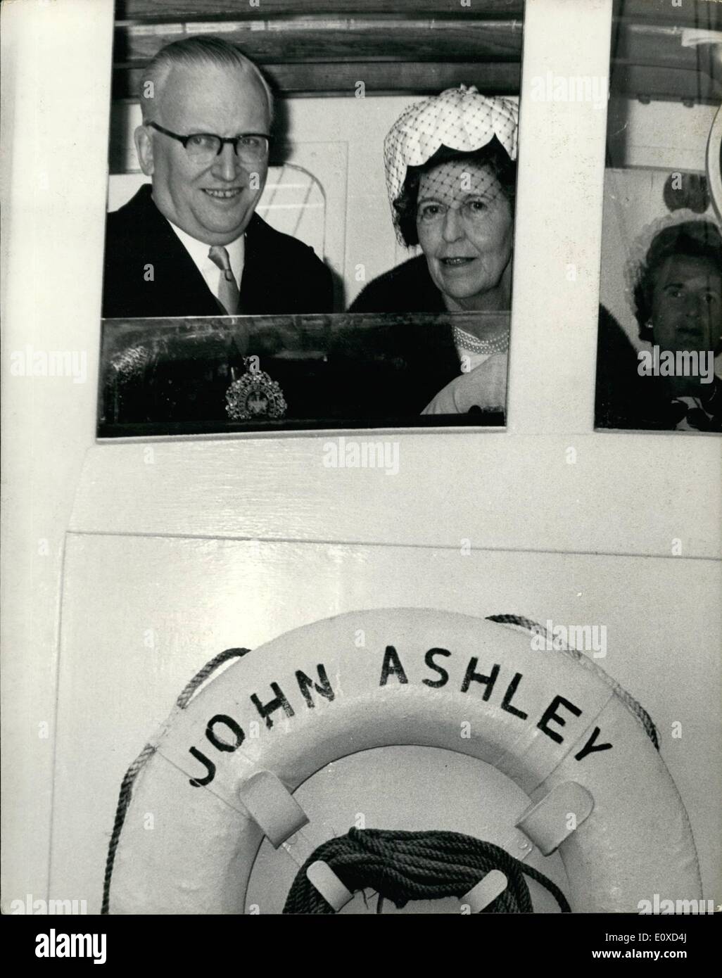 Jun. 06, 1966 - Lord Mayor Visits Floating Church This morning the Lord Mayor, Sir Ralph Perring. paid a visit to the Motor Vessel John Ashley when it means to the Pool of London.The John Ashley is a floating Church and club operated any the ''Flying Angel'' Missions to Seamen, and visits ships moored in the Thames and Medway. Photo Shows The Lord Mayor Sir Ralph Perring and Lady Perring look out from the Wheel house of the John Ashley in the Pool Of London this morning. Stock Photo