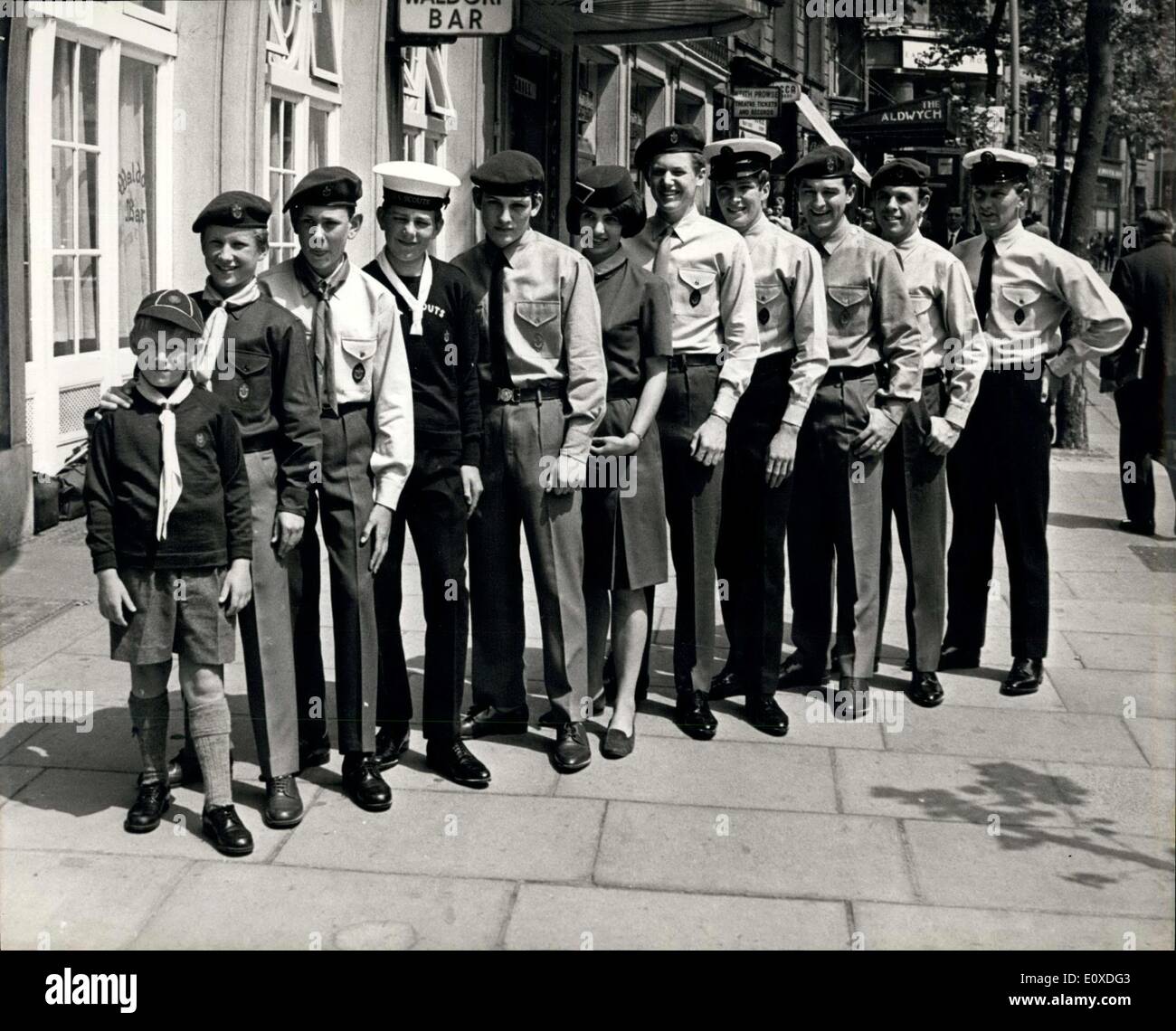 Jun. 10, 1966 - New Look For Scouts: The Chief Scout, Sir Charles Maclean yesterday announced proposals for a new look in the Boy Scout movement in Britain. The word ''boy'' will go and Wolf Cubs will be known as Cub Scouts. Senior and Rover Scouts will disappear in favour of ''Venture'' Scouts aged 8-11, shorts will no longer be part of the uniform. They will be replaced for Scouts aged 11 to 16 by mushroom-coloured trousers, slightly tapered and without turn-ups. Photo shows Here are the new Scout uniform to be worn from Oct. 1 next year Stock Photo