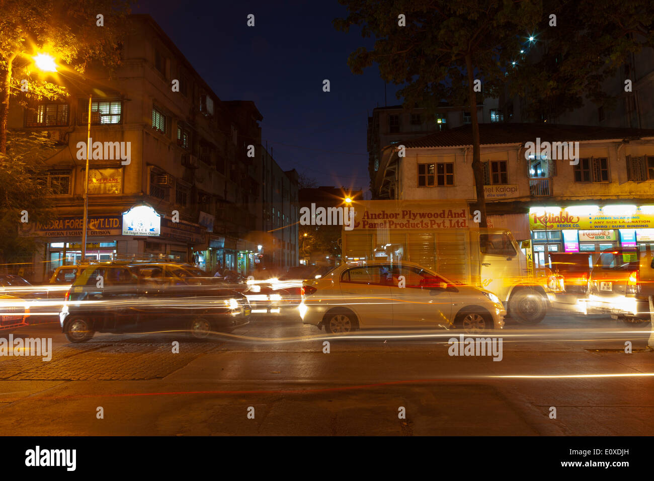 Light trails from traffic in a busy street during the evening, Mumbai, India. Stock Photo
