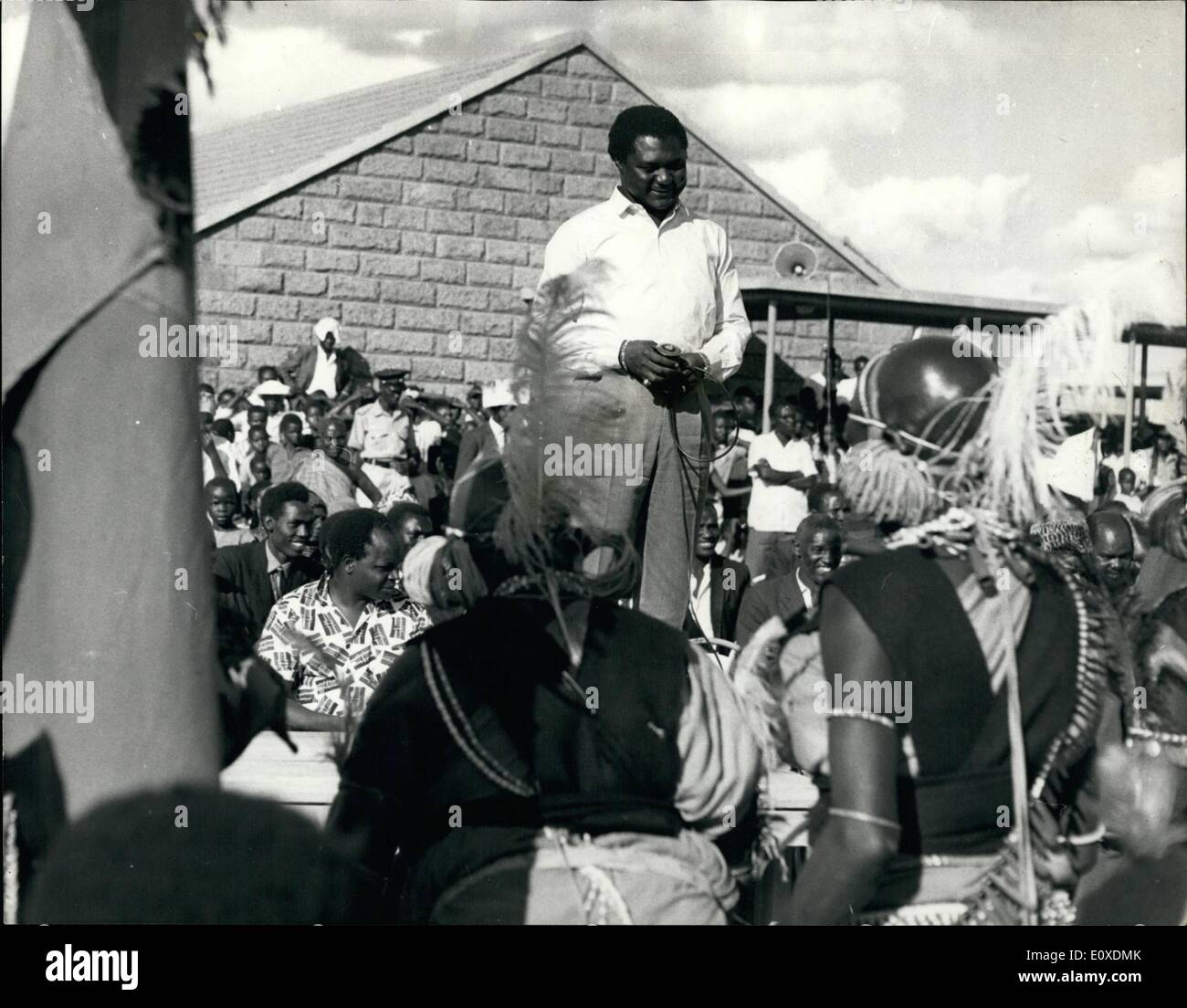 May 05, 1966 - Kanu Rally in Nairobi.: Thousands of Kanu supporters listened in silence as the party's secretary-general and Minister for Economic Planning and Development, Mr. Mboya, claimed at a Nairobi rally on Saturday that there was a ''conspiracy'' to overthrown Mr. Kenyatta's Government. Earlier speakers faced a barrage of hackling from supporters of the Kenya People's Union. Mr. Mboya referred to the ''tragic events'' in Africa during the past few months with military coups in a number of States and in some countries leaders being assassinated. Mr Stock Photo