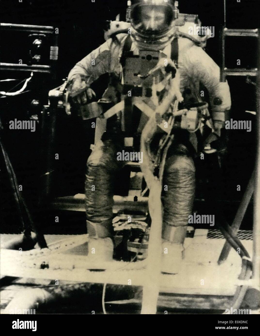 May 05, 1966 - Cernan is pictured training in a simulation chamber for his upcoming space expedition at the Manned Spacecraft Center in Houston, Texas. He is wearing a new spacesuit with oxygen tank reserves on the chest and back. Gemini 9 will be going into space on ne Stock Photo