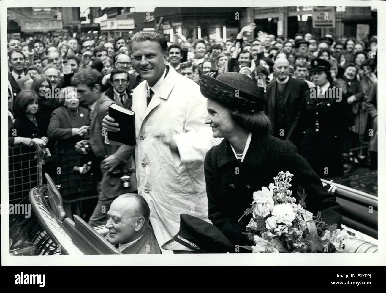 May 05, 1966 - WELCOME FOR BILLY GRAHAM. The well known Evangelist, DR. BILLY GRAHAM, arrived here yesterday, for his 32-day crusade, which starts at Earl's Court next week. PHOTO SHOWS: BILLY GRAHAM and his wife, RUTH, are pictured at Waterlee yesterday after arriving from Southampton. Stock Photo