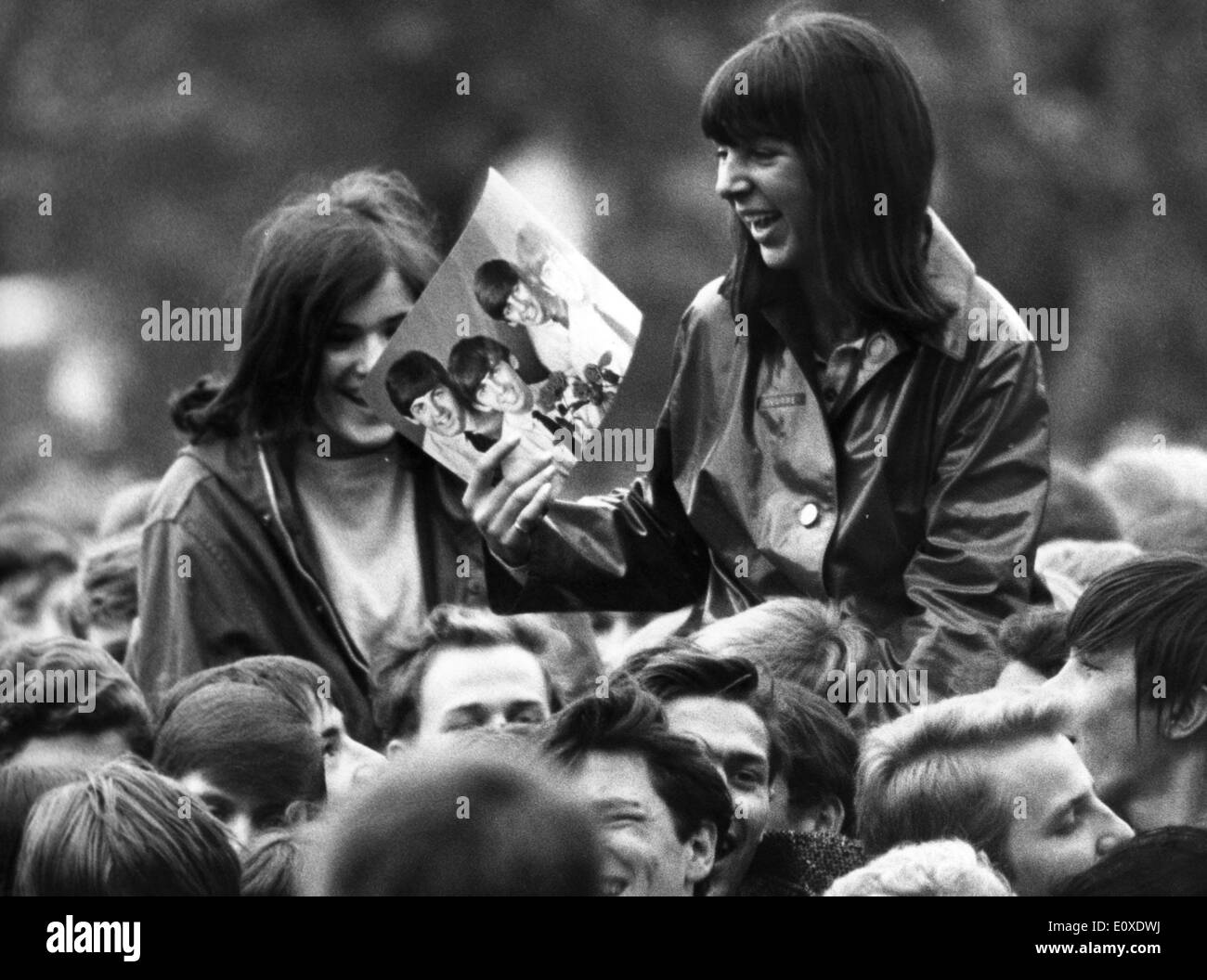 Young Beatles fans cheer at concert Stock Photo