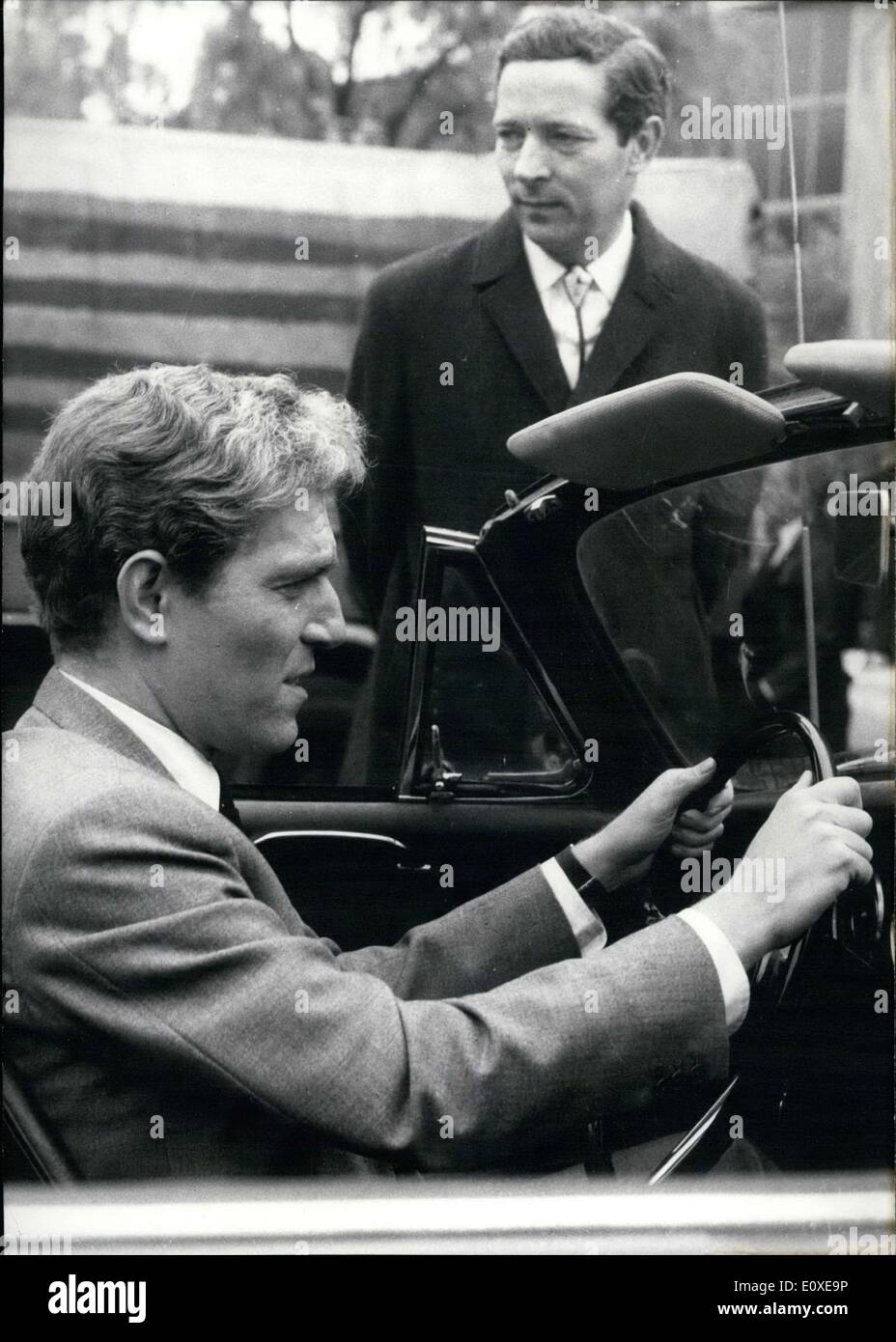 May 11, 1966 - Pictured is George Segal(in the car) during a scene from the movie ''The Quiller Memorandum,'' which filmed in Berlin. Other actors in the movie include Sir Alec Guinness and Senta Berger. Stock Photo