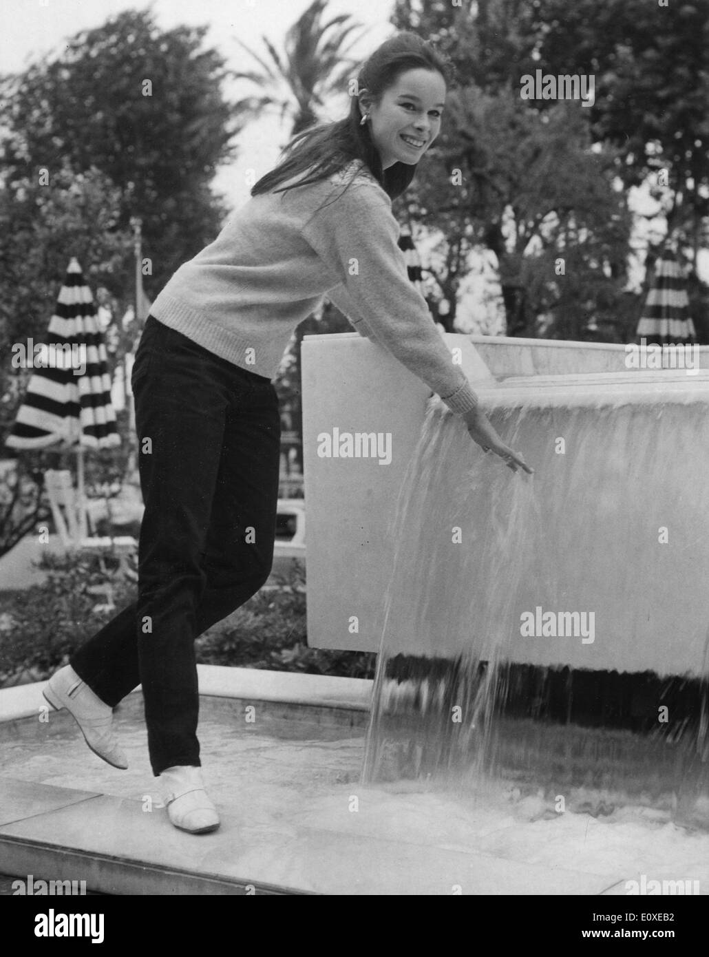 May 14, 1966 - Cannes, France - Ballet Dancer GERALDINE CHAPLIN plays in a fountain at her hotel before attending the premiere of the film, 'Doctor Zhivago.' Stock Photo