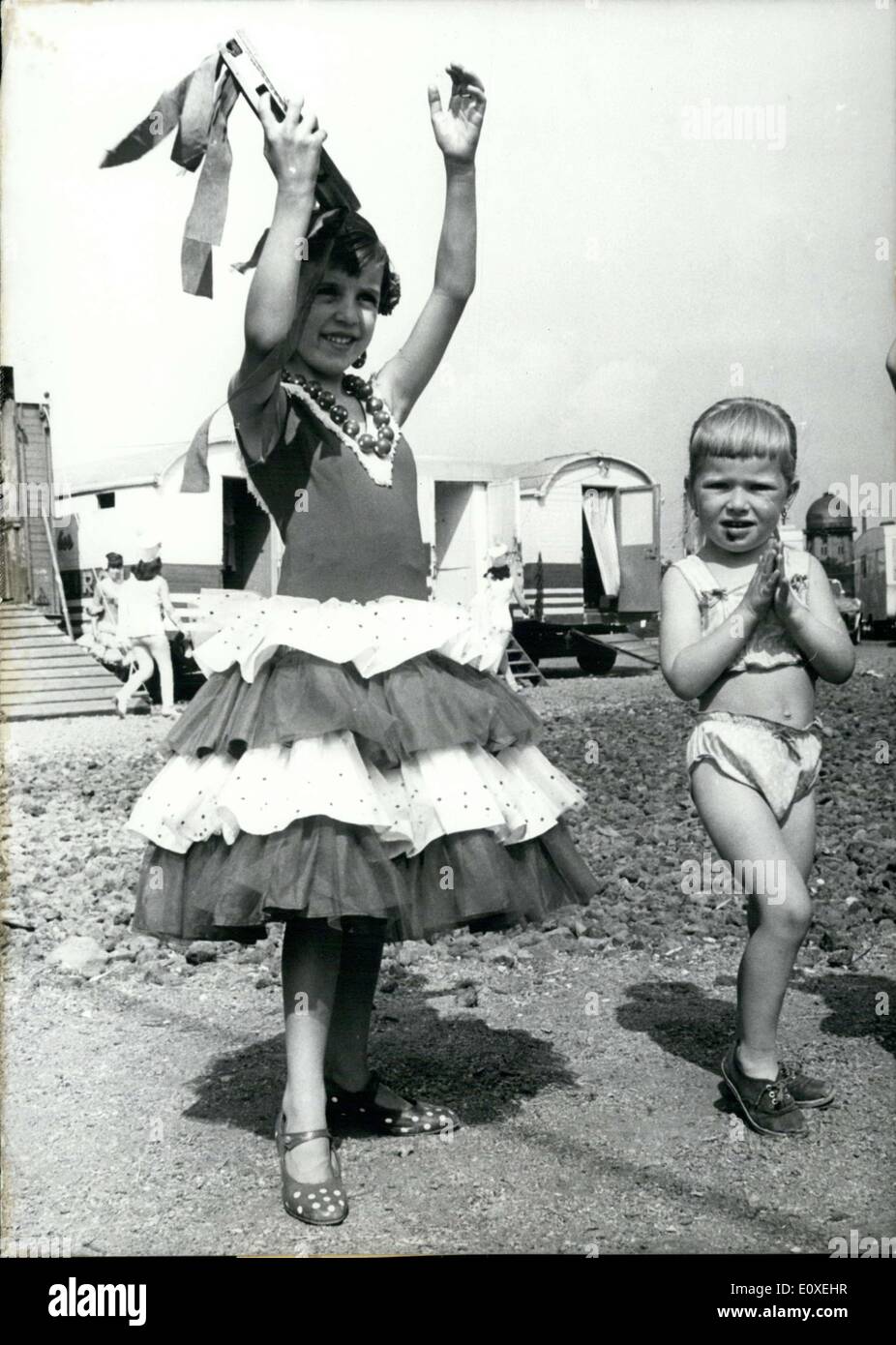 May 21, 1966 - Pictured here is Carmen(left) and a spectator watching her. Carmen is a dancer in a circus currently guesting in Stock Photo