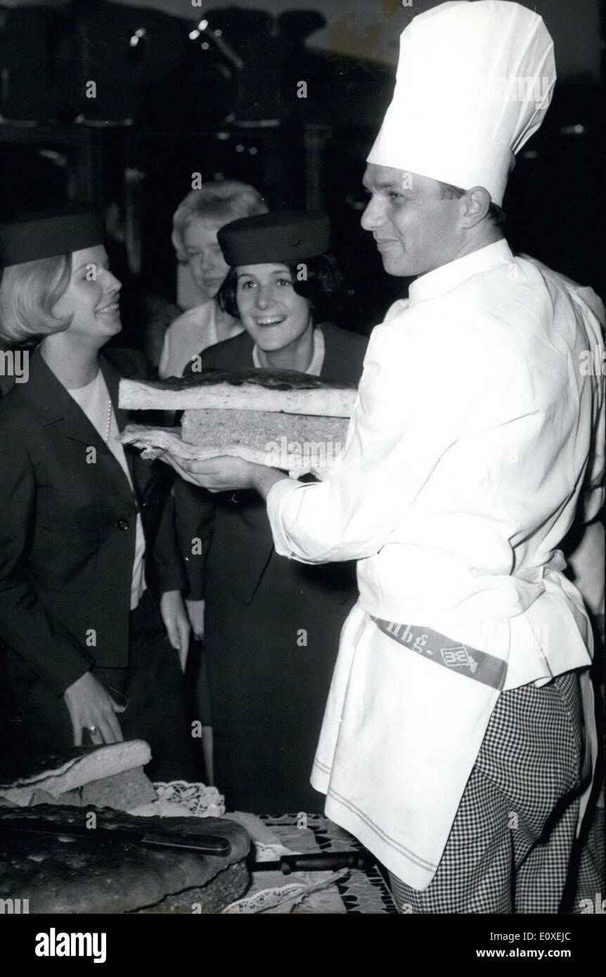 May 25, 1966 - Pictured here is a giant hamburger weighing around 100 kilograms. It was doled out to passers-by on the Reeperbahn in Hamburg. It was made in celebration of the opening of a new locale. Stock Photo
