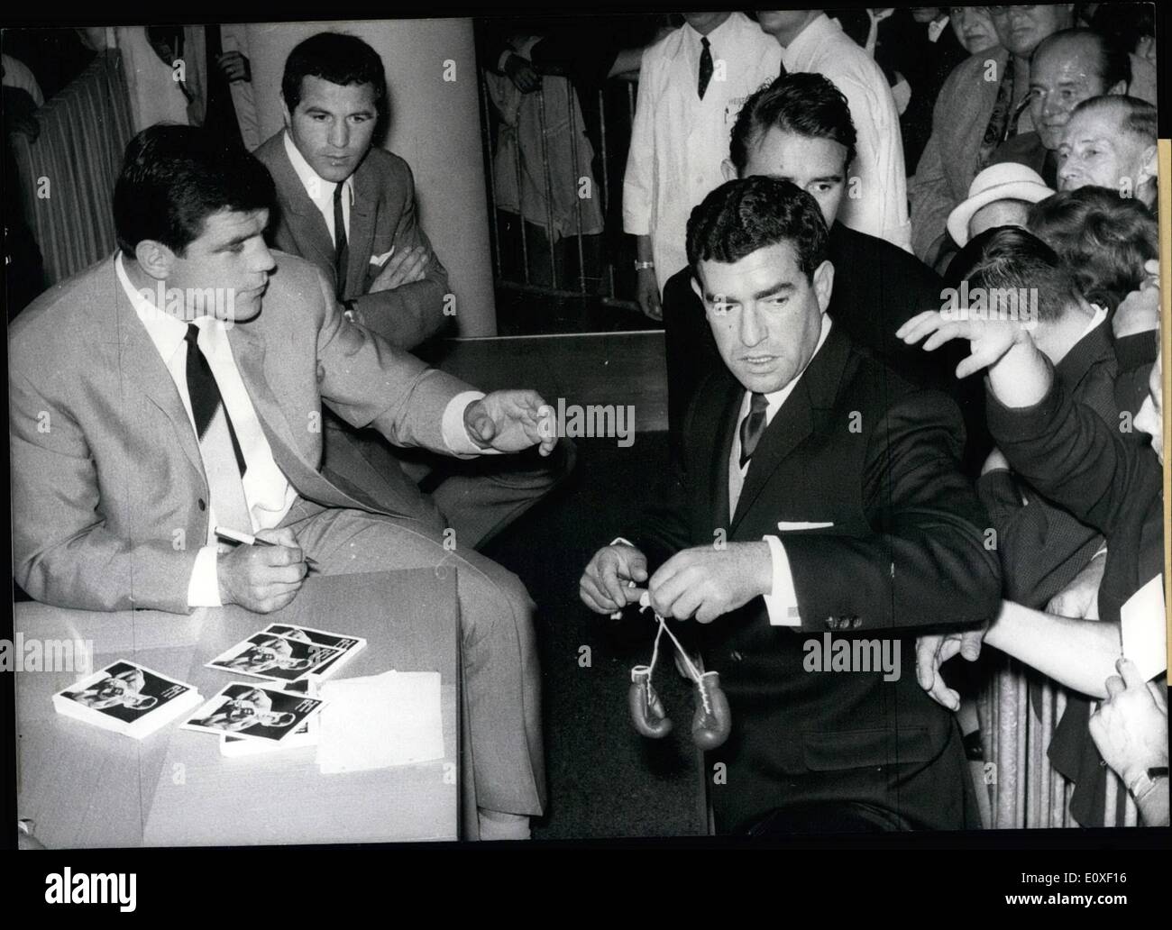 Aug. 08, 1966 - Great Popularity: is presently enjoying Karl Mildenberger, European boxing-champion in the heavy-weight-class. On Sept. 10th, he will be fighting in Frankfurt against Cassiu Clay for the world-championship. Our Picture shows Mildenberger while giving autographs and an interview for his fans in a warehouse in Frankfurt. Stock Photo