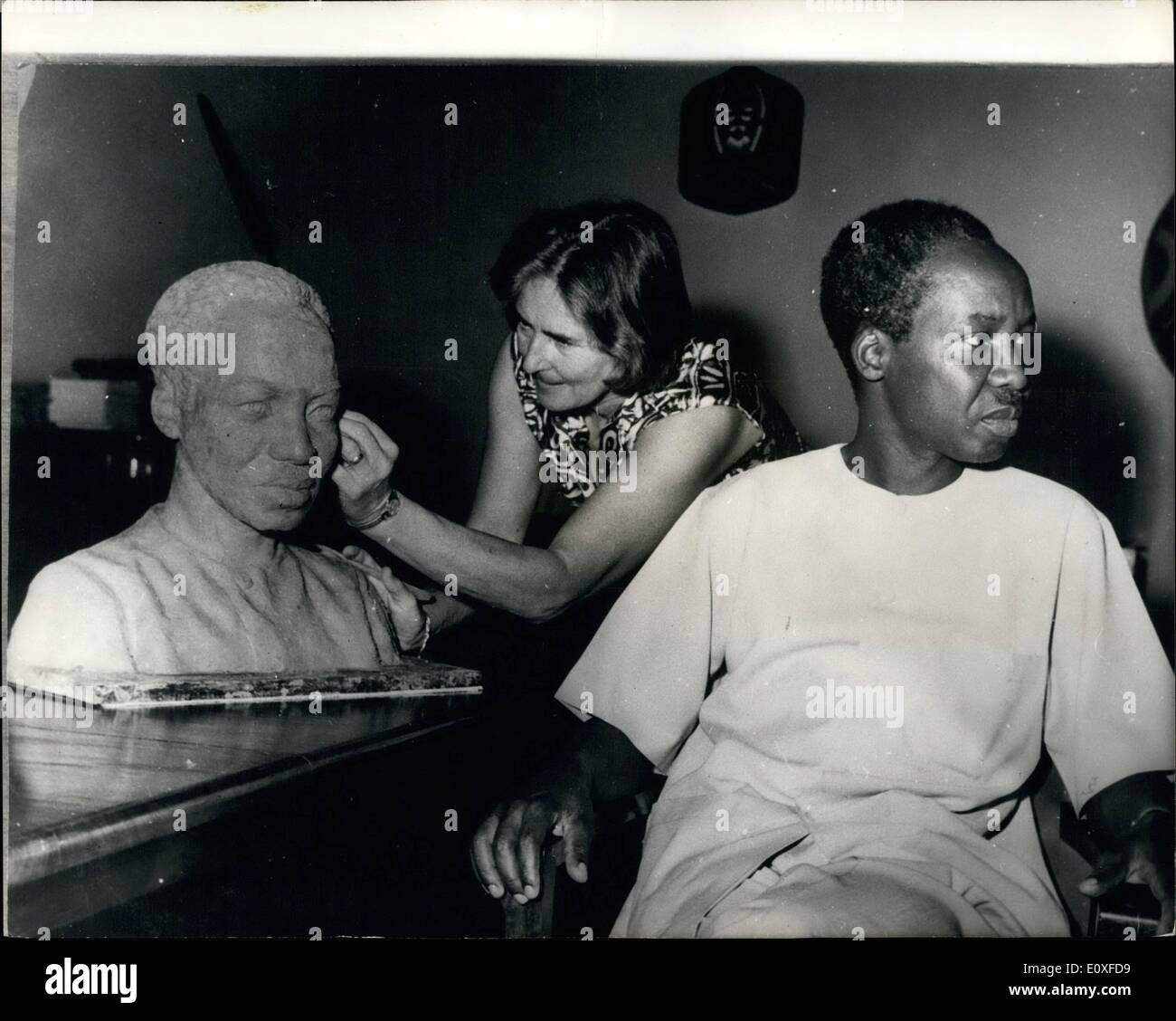 Aug. 08, 1966 - British - born sculptress completes bust of President Nyerere.: The well-known British born sculptress, Mrs. Clara Quien (she born in Bromley,Kent), has just completed a slightly larger than life-size bust of President Nyerere of Tanzania. The bust is being taken to Italy where several replicas will be made in bronze. Mrs. Quien completed the bust in seven sittings, each lasting an hour with President Nyerere, at State house, Dar as Salaam. The bronze bust will be sold and the money used for charitable purposes Stock Photo