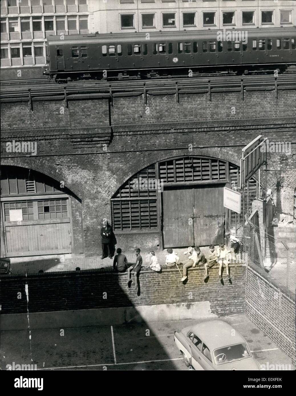 Aug. 08, 1966 - The Munder Car Found in Garage in Tinworth St. Lambert. The car which was used in the shooting of the tree London Policemen of Friday afternoon in Braybrook St. Shepherd's Bush was found early this morning in a Garage under a Railway Arch in Tinworth Street, Lambeth. The police were informed by Mrs. Elizabeth Pentlin who resides in a block of flats overlooking the garage, she told the police that she saw the car being driven into the garage about 4 o'clock in Friday afternoon which was about 30 mins after the killing of the tree policemen Stock Photo