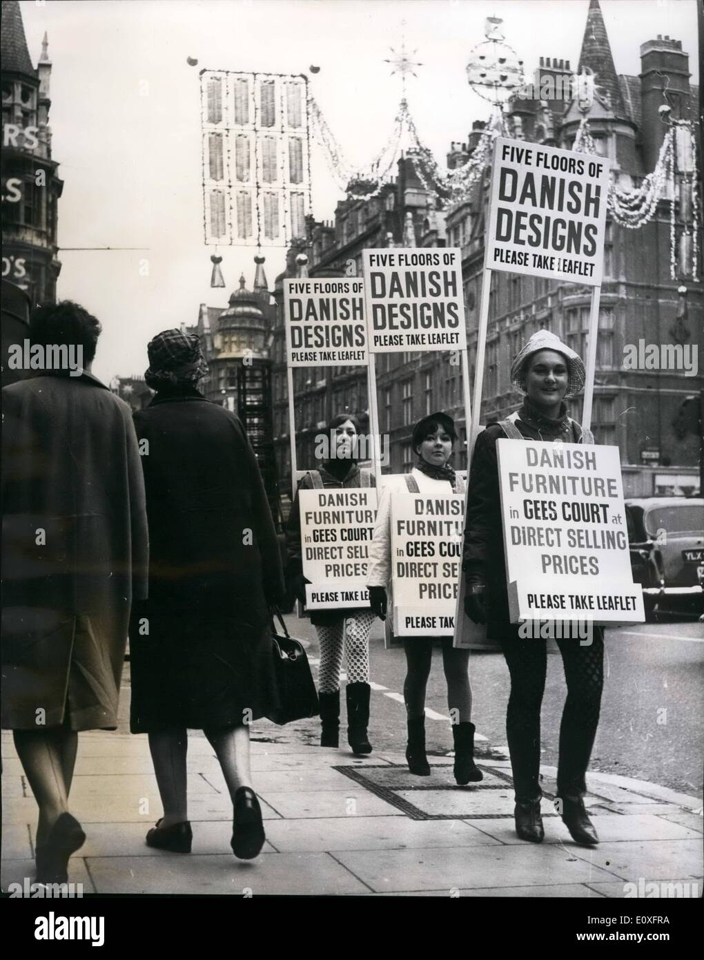 Nov. 11, 1966 - Girls apply for sandwich board job and get it: The newspaper advertisement said Sandwich Board men Wanted. Applying for the job were three girls Mairi Maclean of Glasgow, Helen Abercrombie, of Glasgow, and Guinea Hunter, of Wembley, and they started work this morning in the West End of London. Photo shows the three girls pictured with their Sandwich Boards after starting work, in Oxford Street today. They are: From front to rear: Guinea Hunter, of Wembley; Helen Abercrombie, of Glasgow, and Mairi Maclean, also of Glasgow. Stock Photo