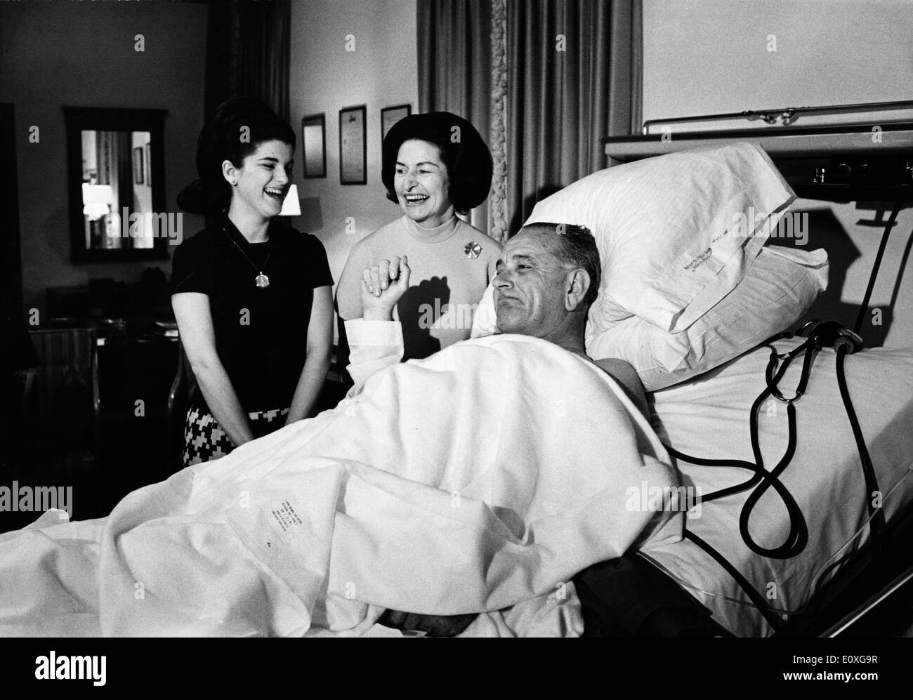 President Johnson visited in the hospital by his wife and daughter Stock Photo