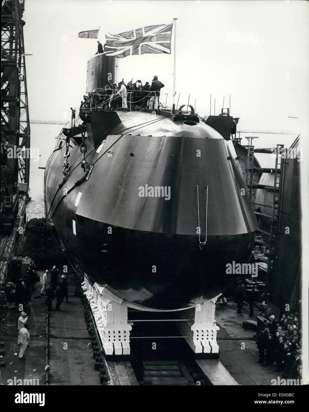 Sep. 09, 1966 - Queen Mother Launches Polaris Submarine: Queen Elizabeth the Queen Mother today launched Britain's first Polaris Submarine, H.M.S. Resolution, at Barrow in Furness. H.M.S Resolution is the first of four British Polaris submarines now being built to be launched. About 7,000 tons, she is due to begin operational patrols in May, 1968, armed with 16 Polaris missiles with a range of 2,500 nautical miles. All four Polaris submarines should be operational by 1970. Photo shows H.M.S Resolution slips down to the sea after being launched by H.M Queen Mother. Stock Photo