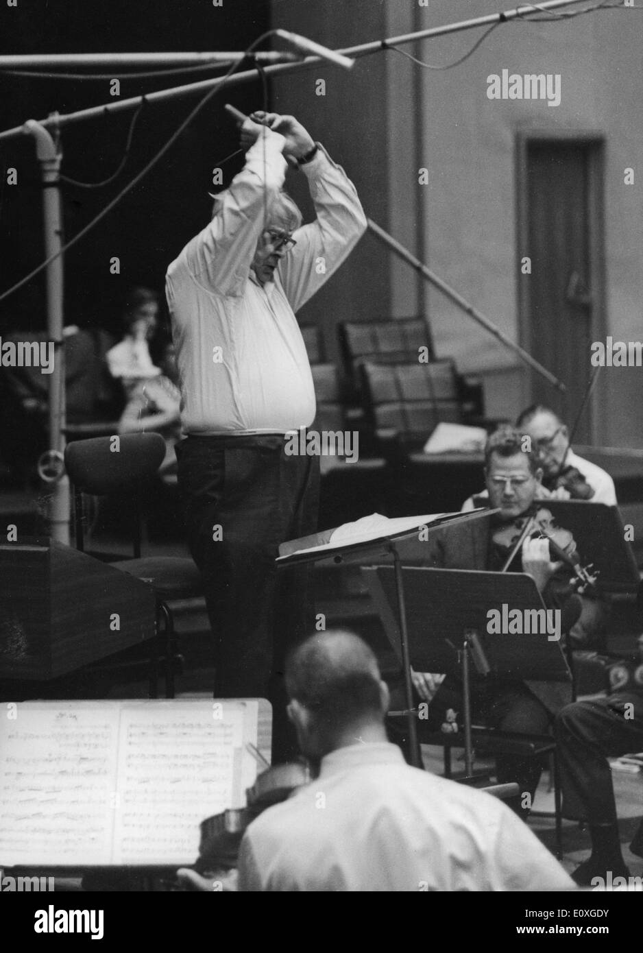 Sep. 9, 1966 - Paris, France - CHARLES MUNCH directs rehearsal Paris Radio House for his 75th Birthday concert. Stock Photo