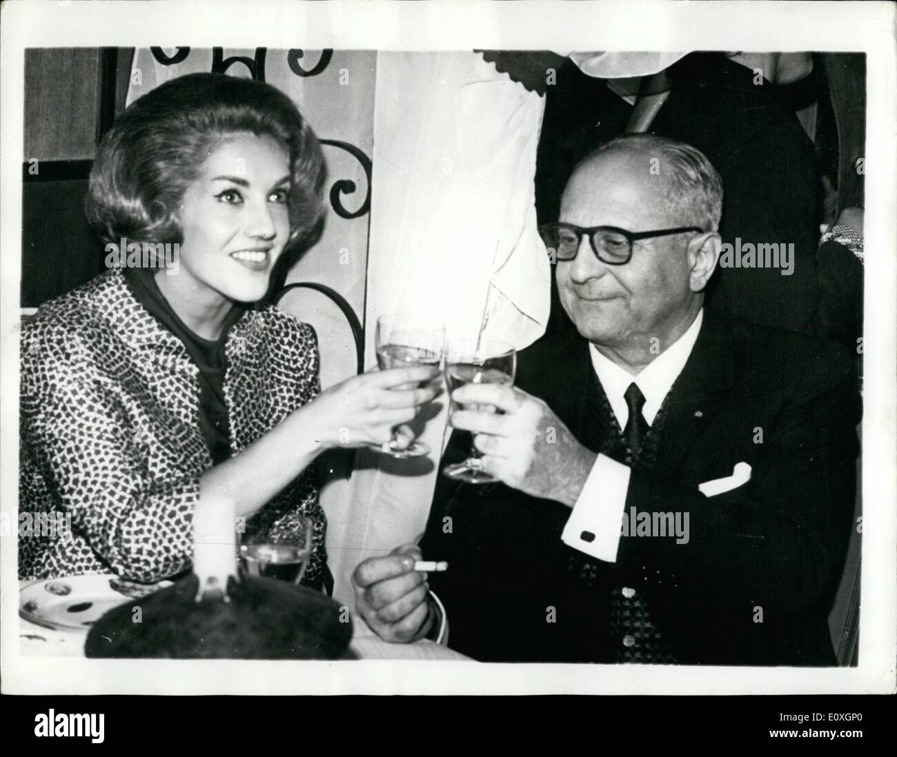 Oct. 10, 1966 - Baron James De Roths Child Weds Theater Usherette.: 72 years old Baron James de Roths Child today married 28 years old theater usherette, Yvette Choquet, in Paris. Photo shows the couple toasting after today's civil wedding in Paris. Stock Photo