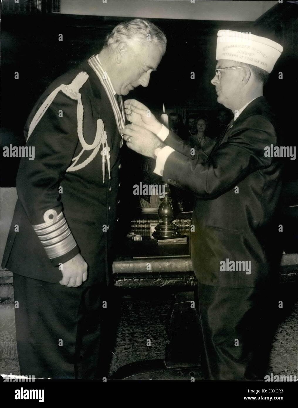 Oct. 10, 1966 - Earl Mountbatten and Douglas Fairbanes Jnr. Are presented with V.F.H. C-In-C's Gold Medal of Merit: The presentation of Commander-in-chief Gold Medal of Merit and Citation (Veterans of Foreign Wars of the United States) to Admiral of the Fleet, Earl Mountbatten of Burma, K.G. and to Captain Douglas Fairbanks, Jr. United States Naval Reserve (retired) by the Commander-in-Chief of the VFW, Leslie M. Fry, took place today at Sutton Place, Surrey, the home of Mr, Paul Getty Stock Photo