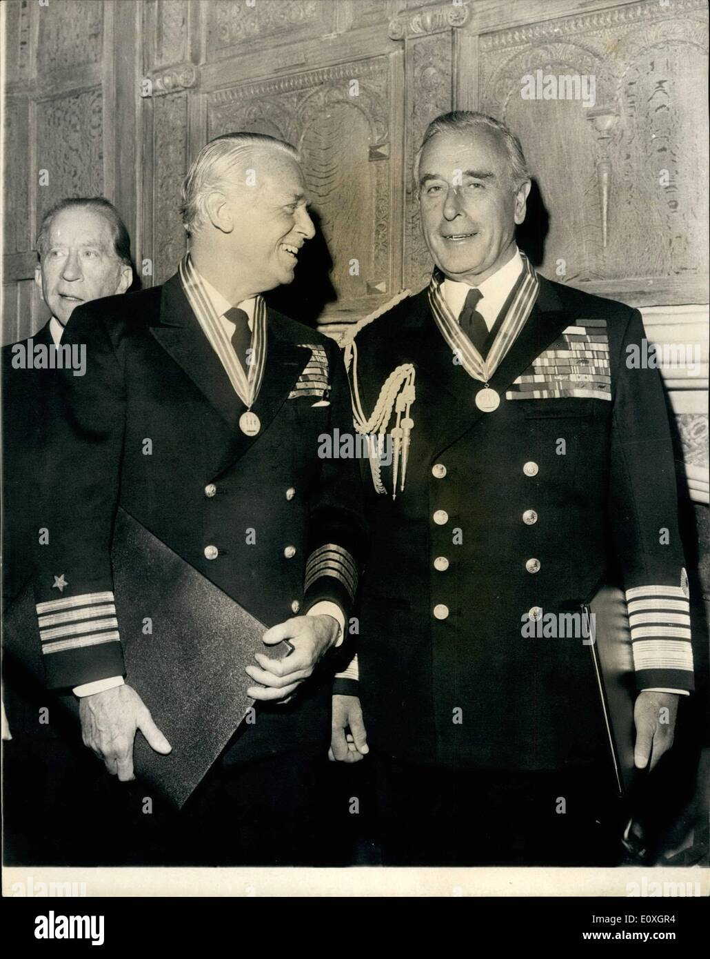 Oct. 10, 1966 - Earl Mountbatten and Douglas Fairbanks Jr. are Presented with VFH C in C's Gold Medal of Merit. The presentation of Commander in Chief Gold Medal of Merit and Citation (Veterans of Foreign Wars of the United States) to Admiral of the Fleet, Earl Mountbatten of Burma, K.G. and to Captain Douglas Fairbanks Jr., United States Naval Reserve (retired) by the Commander in Chief of the VFW, Leslie M. Fry, took place today at Sutton Place, Surrey, the home of Mr. Paul Getty Stock Photo